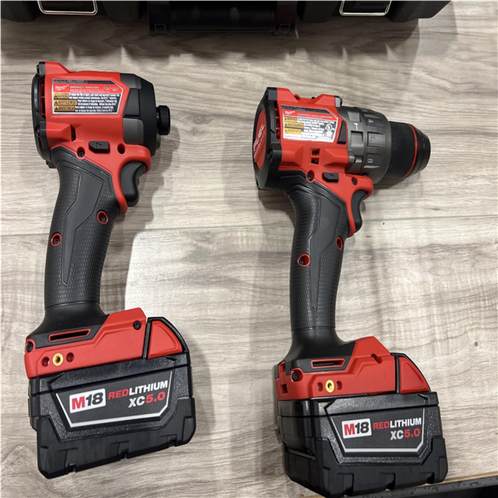 AS-IS Milwaukee FUEL 18V Lithium-Ion Brushless Cordless Hammer Drill and Impact Driver Combo Kit
