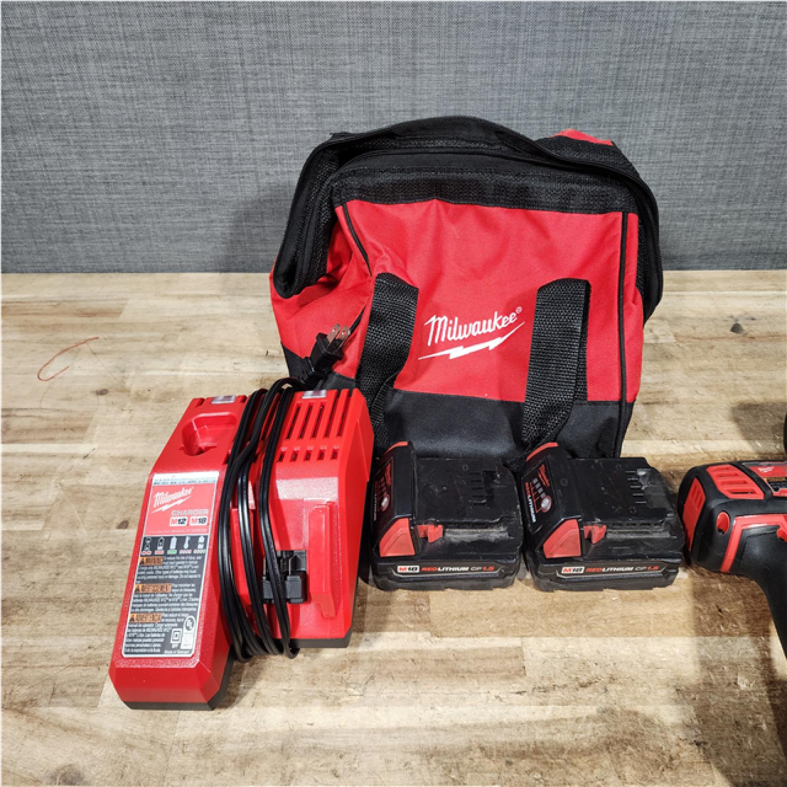 HOUSTON LOCATION - AS - IS Milwaukee 18V Lithium-Ion Cordless Drill Driver/Impact Driver Combo Kit