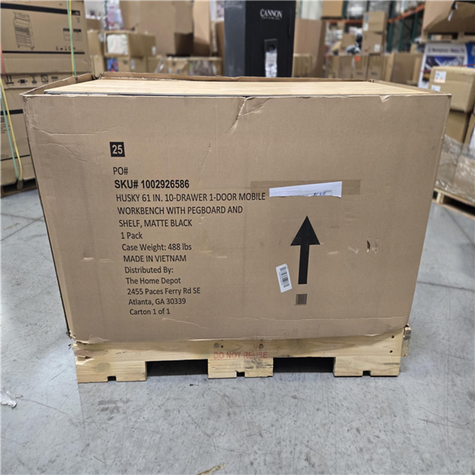 DALLAS LOCATION - AS-IS Husky 61 in. W x 26 in. D Heavy Duty 10-Drawer 1-Door Mobile Workbench with Hardwood Top  Pegboard and Shelf in Matte Black