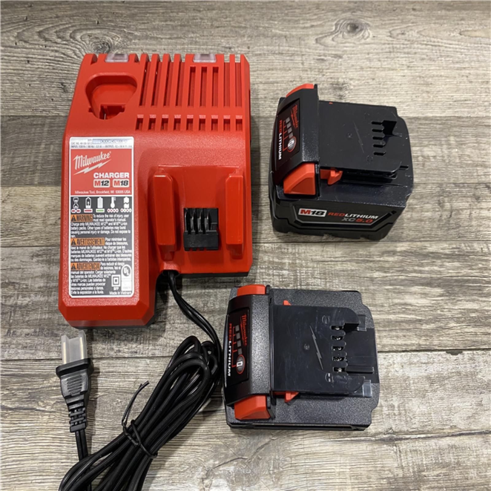 AS-IS Milwaukee 18-Volt Lithium-Ion Starter Kit with One 5.0 Ah and One 2.0 Ah Battery and Charger