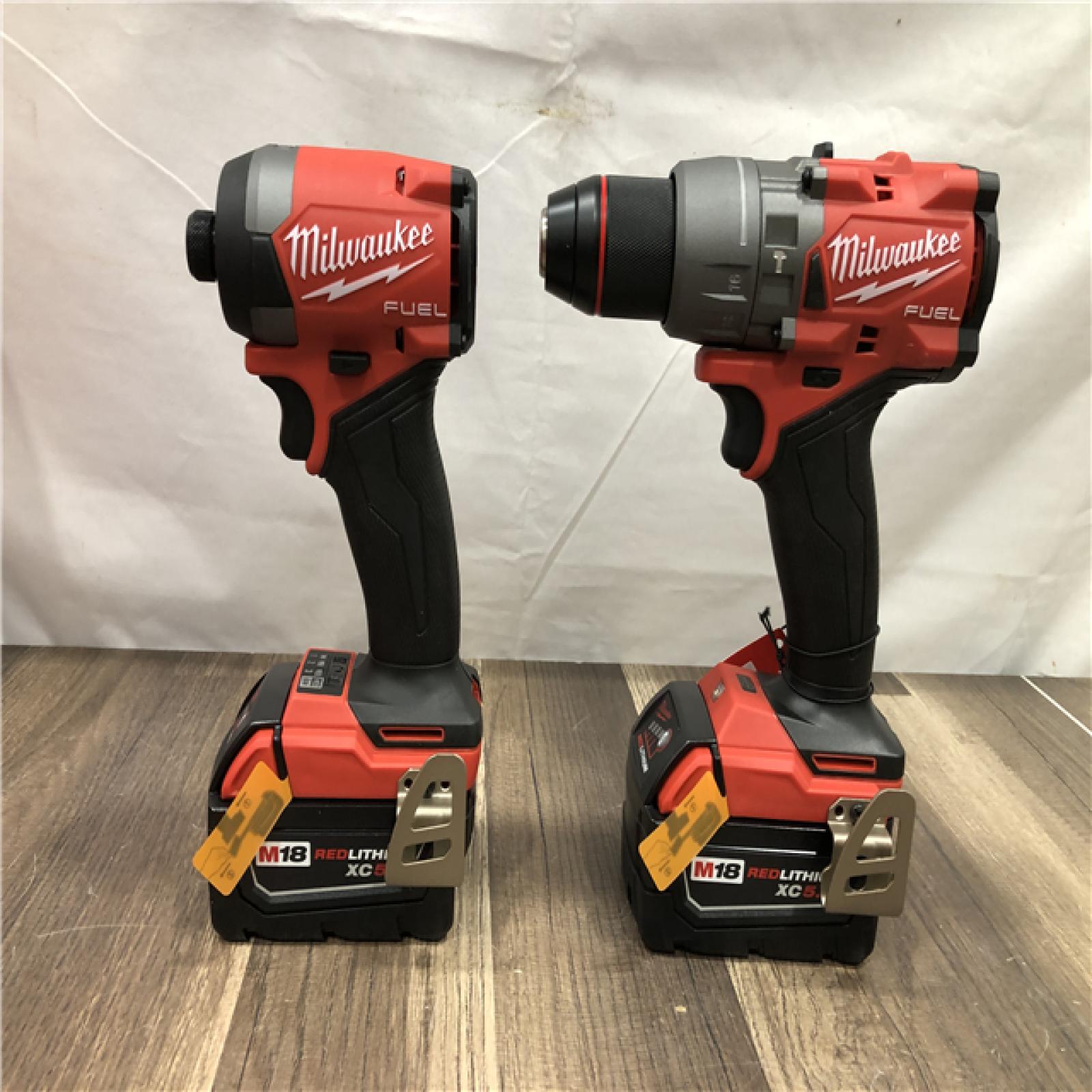 AS-IS Milwaukee FUEL 18V Lithium-Ion Brushless Cordless Hammer Drill and Impact Driver Combo Kit