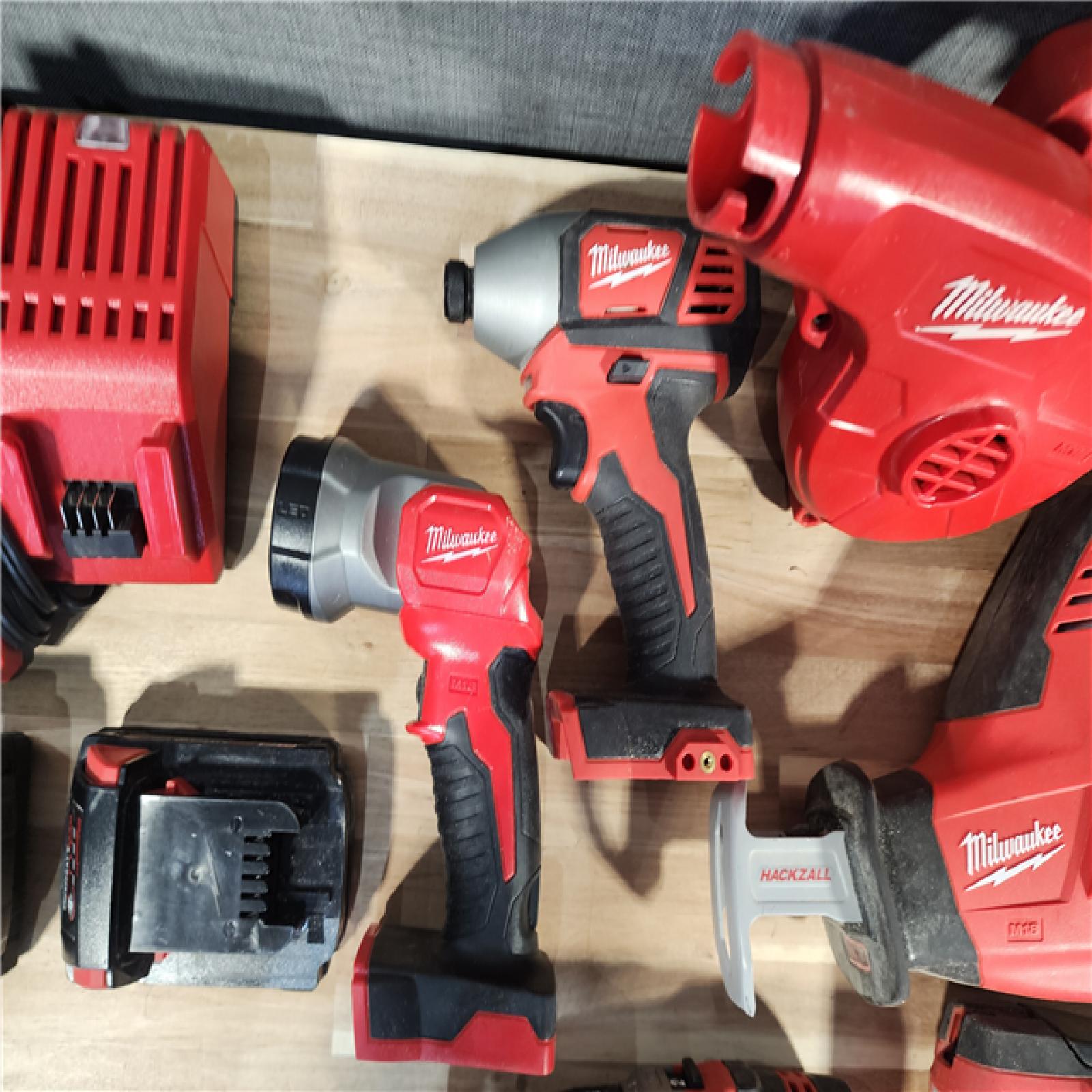 HOUSTON LOCATION - AS-IS M18 18-Volt Lithium-Ion Cordless Combo Kit 9-Tool with 2-Batteries, Charger and Tool Bag