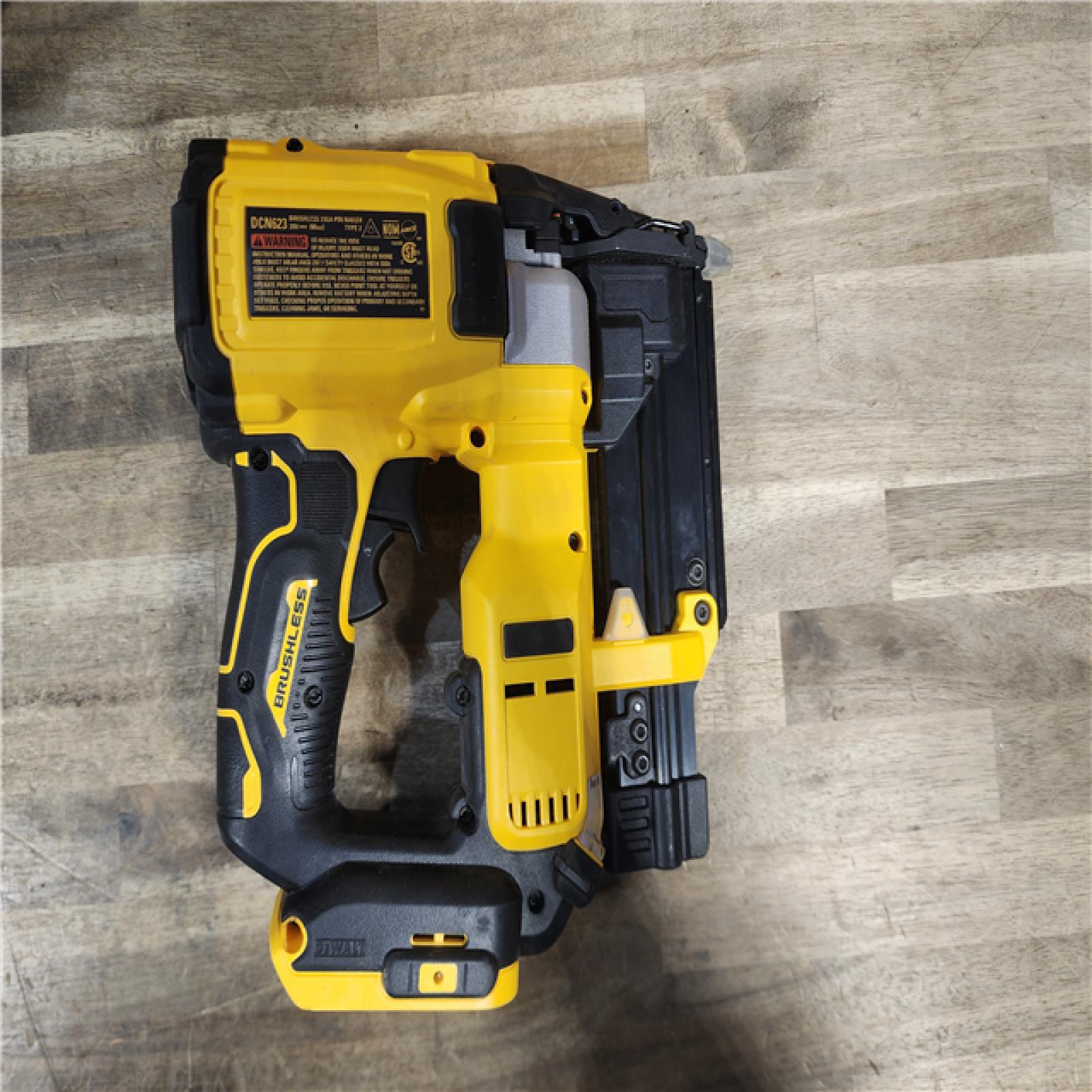 HOUSTON LOCATION - AS-IS DEWALT ATOMIC 20V MAX Lithium Ion Cordless 23 Gauge Pin Nailer Kit with 2.0Ah Battery and Charger