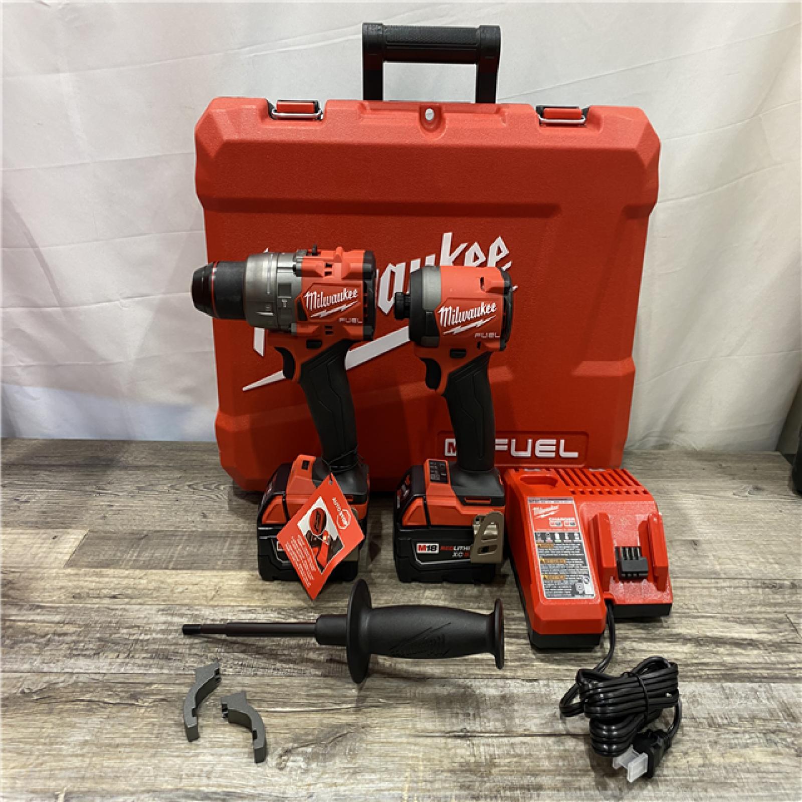 AS-IS Milwaukee  FUEL 18V Lithium-Ion Brushless Cordless Hammer Drill and Impact Driver Combo Kit