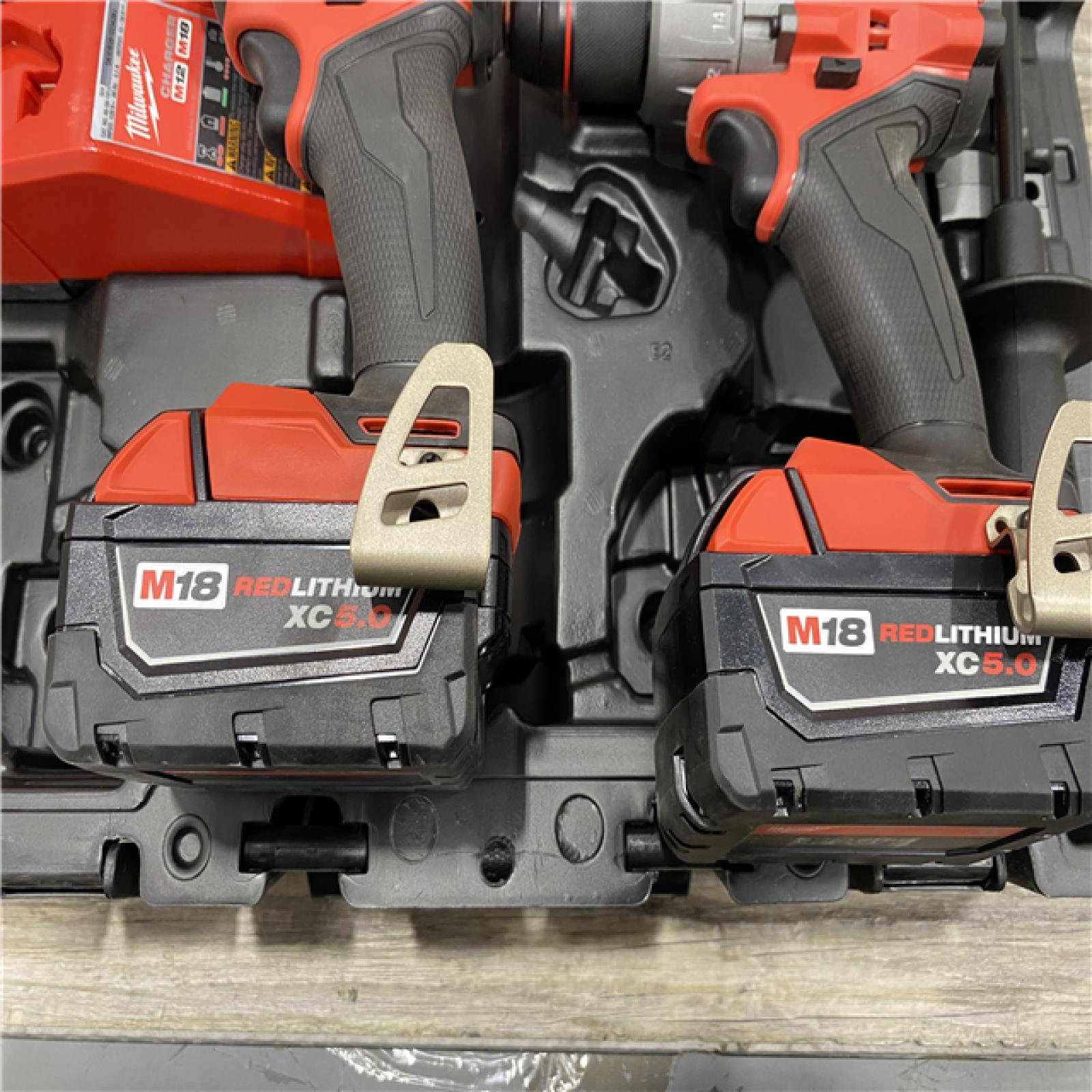 AS-IS Milwaukee FUEL 18V Lithium-Ion Brushless Cordless Hammer Drill and Impact Driver Combo Kit