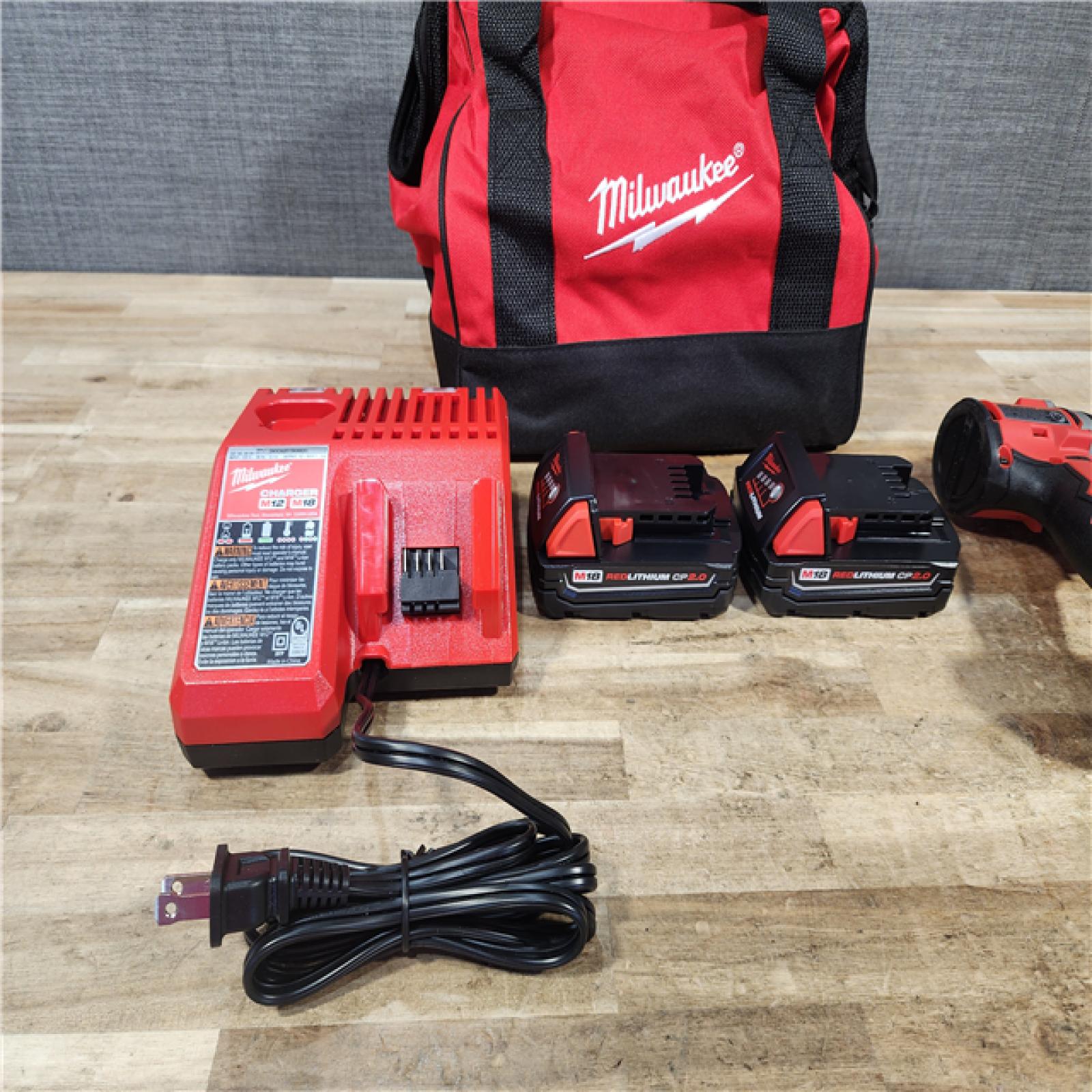 HOUSTON LOCATION - AS - IS Milwaukee 18V Lithium-Ion Brushless Cordless 1/2 in. Compact Drill/Driver Kit