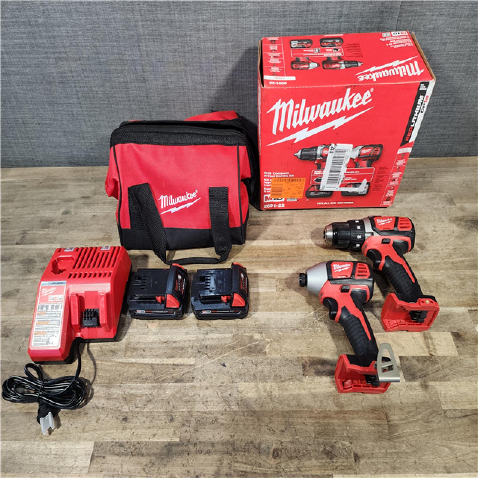 HOUSTON LOCATION - AS-IS Milwaukee 18V Cordless Brushed 2-Tool Drill/Driver and Impact Driver Kit