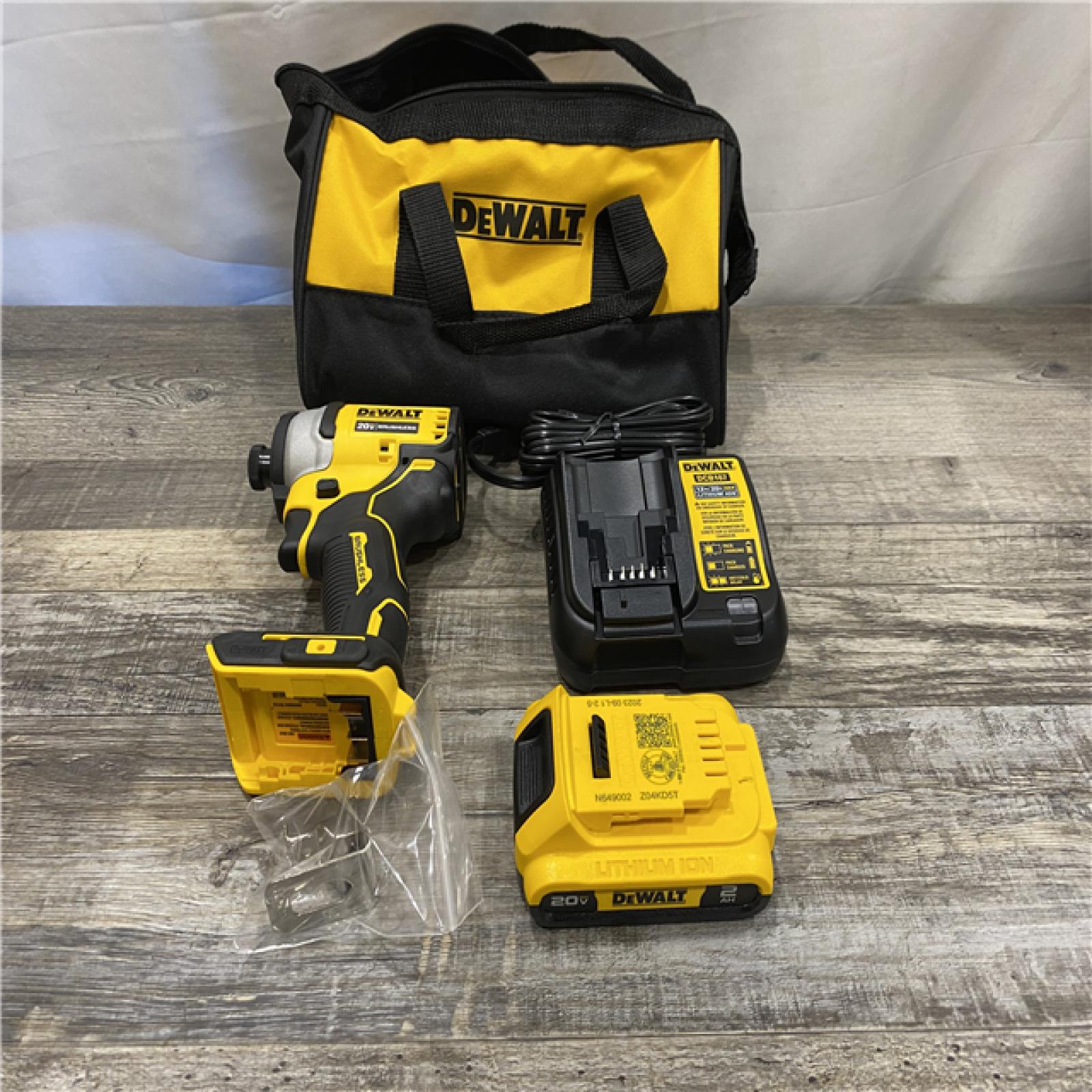 AS-IS DEWALT Atomic 20V Max Lithium-Ion Brushless Cordless Compact 1/4 in. Impact Driver Kit