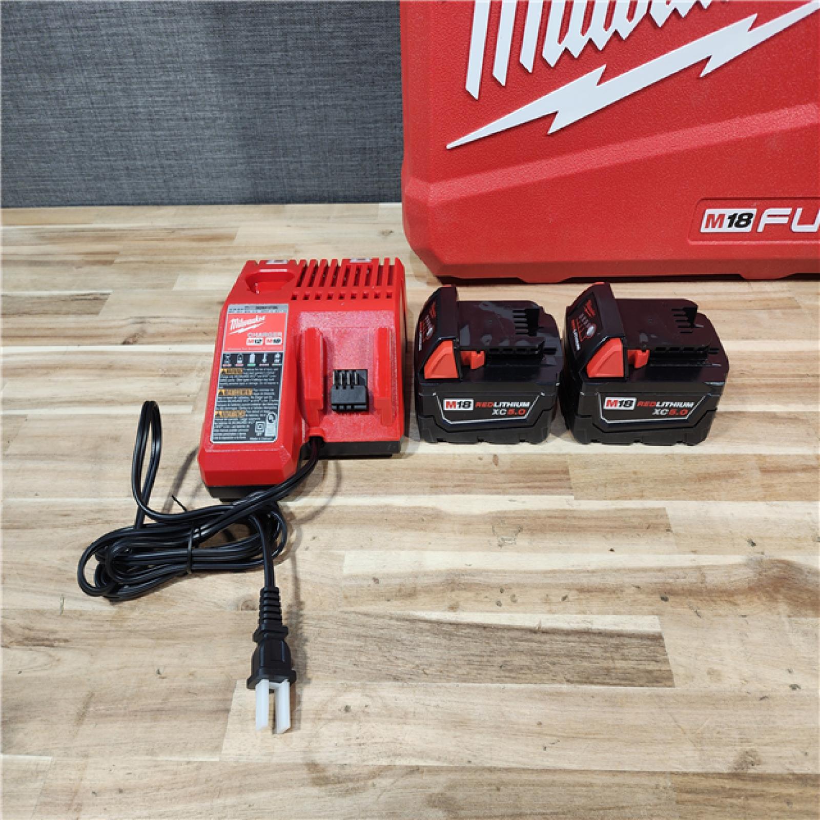 HOUSTON LOCATION - AS-IS (APPEARS LIKE NEW) Milwaukee  FUEL 18V Lithium-Ion Brushless Cordless Hammer Drill and Impact Driver Combo Kit