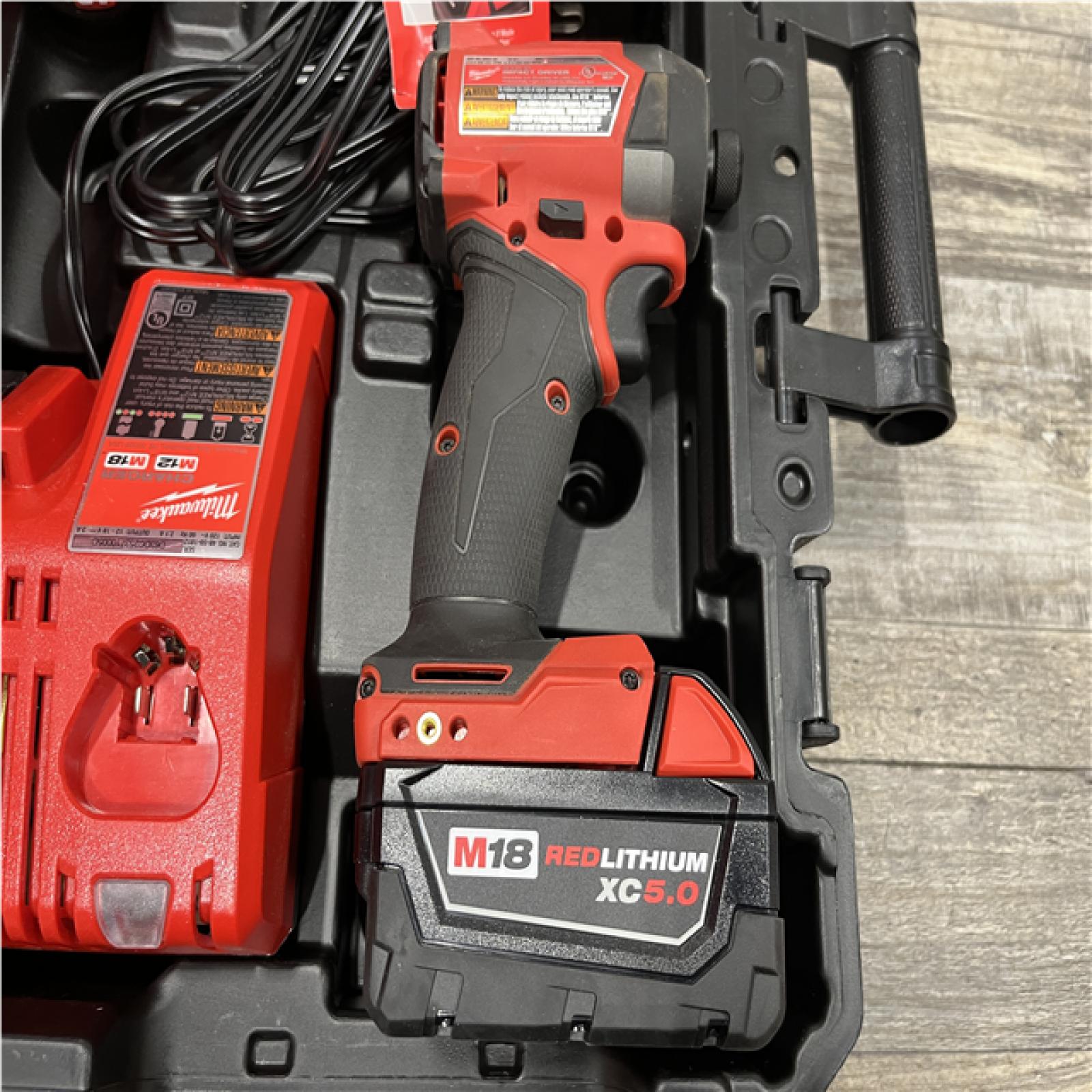AS-IS Milwaukee FUEL 18V Lithium-Ion Brushless Cordless Hammer Drill and Impact Driver Combo Kit