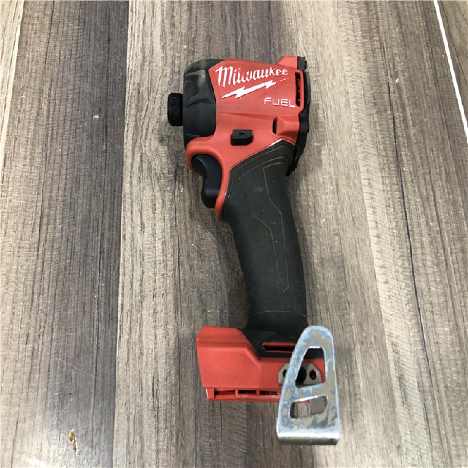 AS-IS  Milwaukee FUEL SURGE 18V Lithium-Ion Brushless Cordless 1/4 in. Hex Impact Driver (Tool-Only)