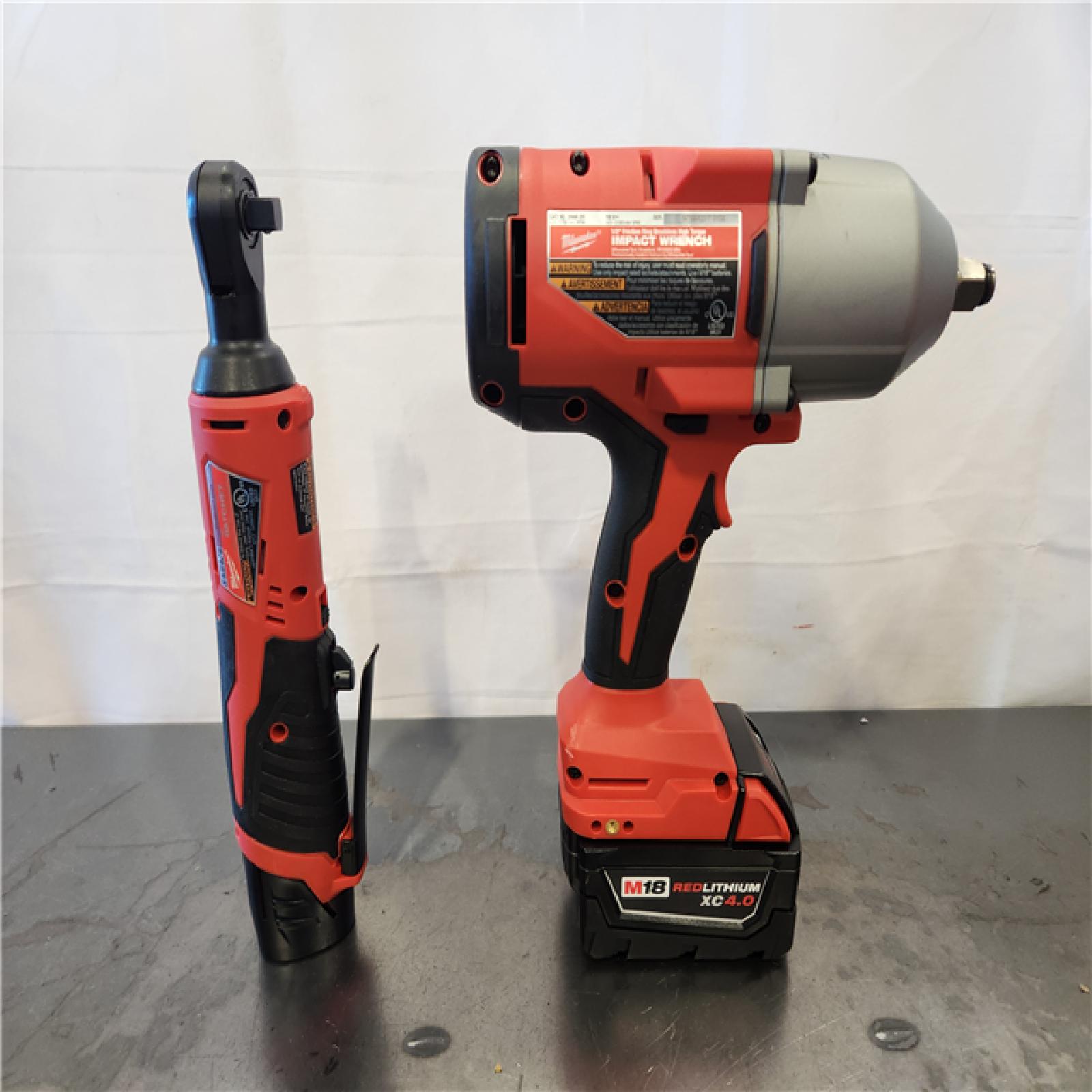 AS-IS- Milwaukee 12/18V Lithium-Ion Cordless 3/8 in. Ratchet and 1/2 in. High Torque Impact Wrench with Friction Ring Combo Kit