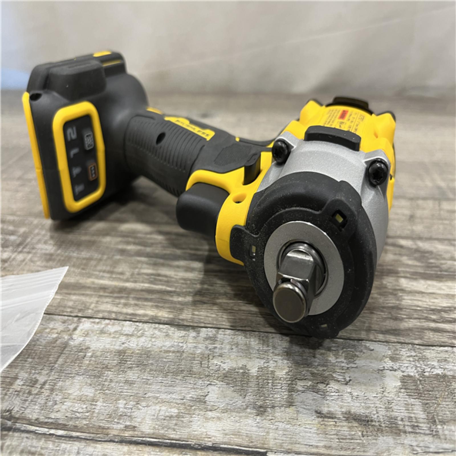 AS-IS DEWALT ATOMIC 20V MAX Cordless Brushless 1/2 in. Variable Speed Impact Wrench (Tool Only)