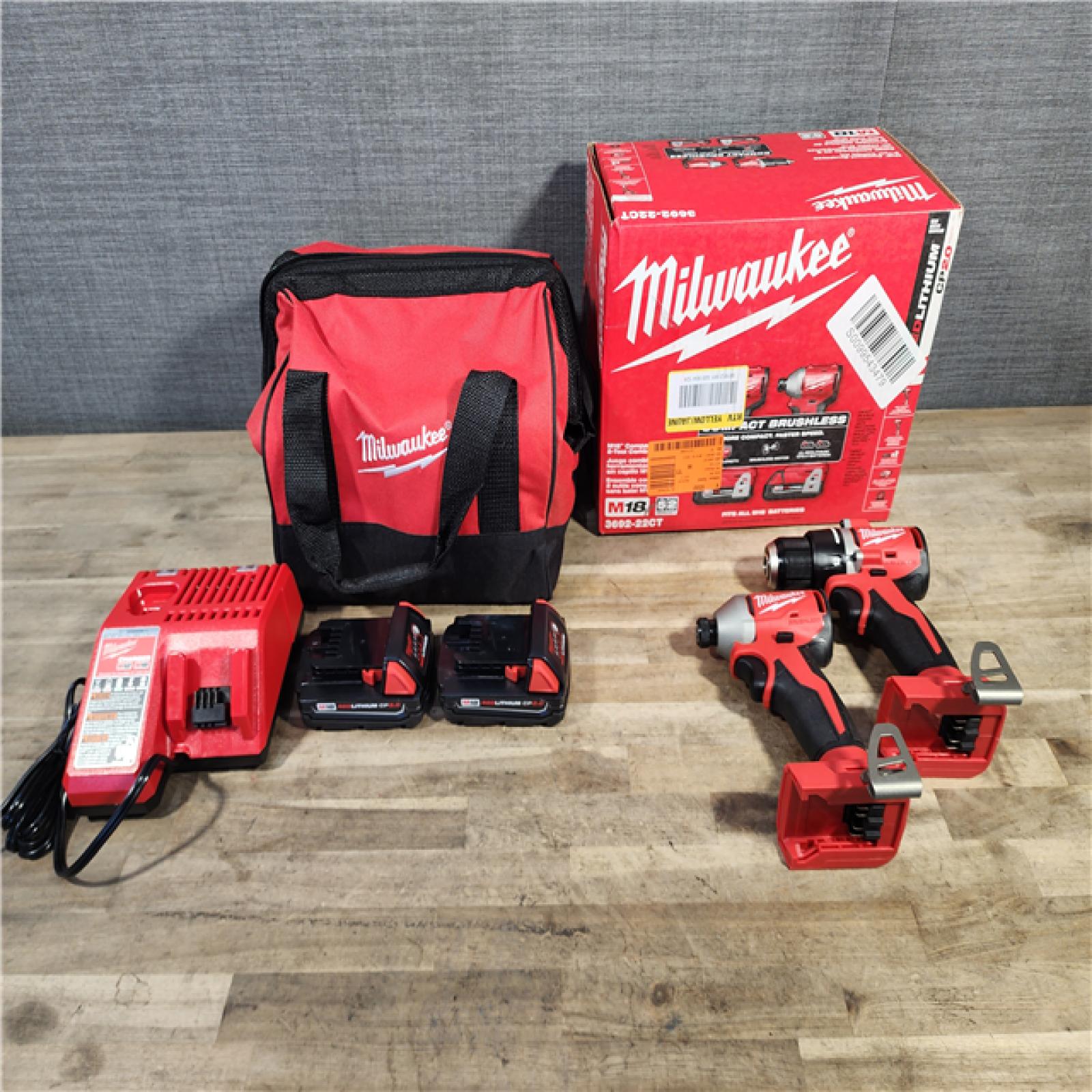 HOUSTON LOCATION - AS-IS Milwaukee M18 18V Lithium-Ion Brushless Cordless Compact Drill/Impact Combo Kit (2-Tool) W/(2) 2.0 Ah Batteries, Charger & Bag