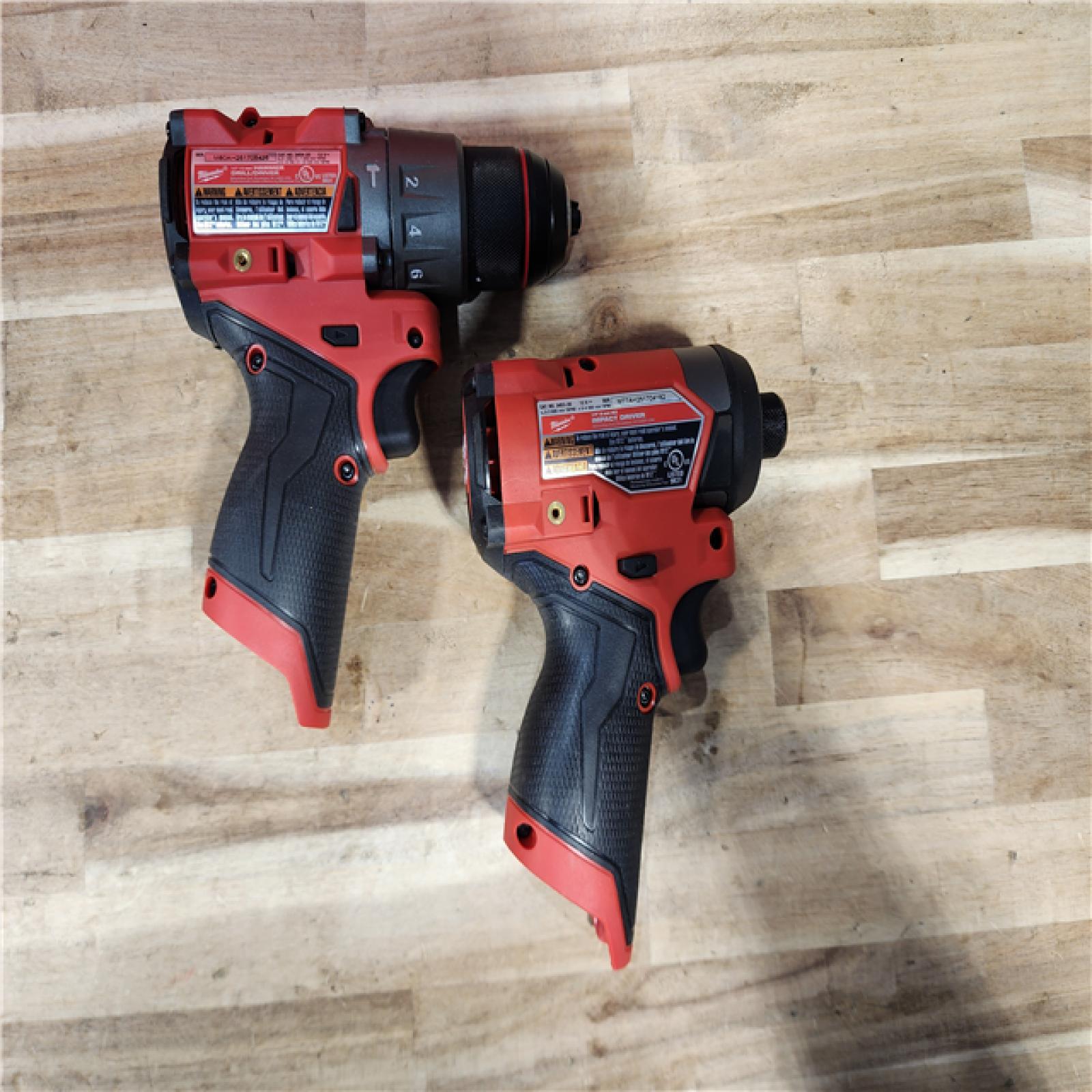 HOUSTON LOCATION - AS-IS Milwaukee  FUEL 12-Volt Lithium-Ion Brushless Cordless Hammer Drill and Impact Driver Combo Kit
