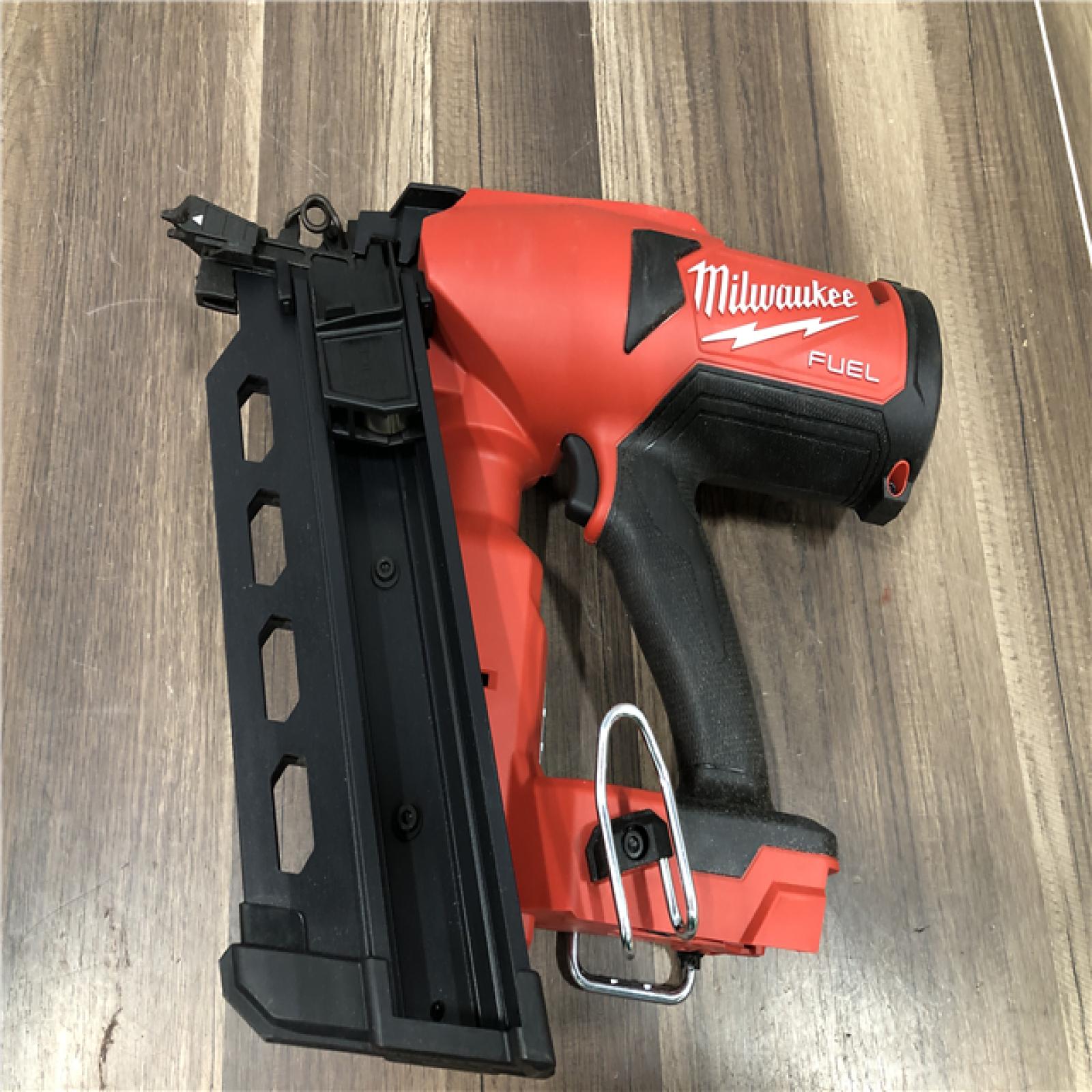 AS-IS Milwaukee M18 FUEL 18-Volt Brushless Lithium-Ion Cordless 21-Degree Duplex Nailer