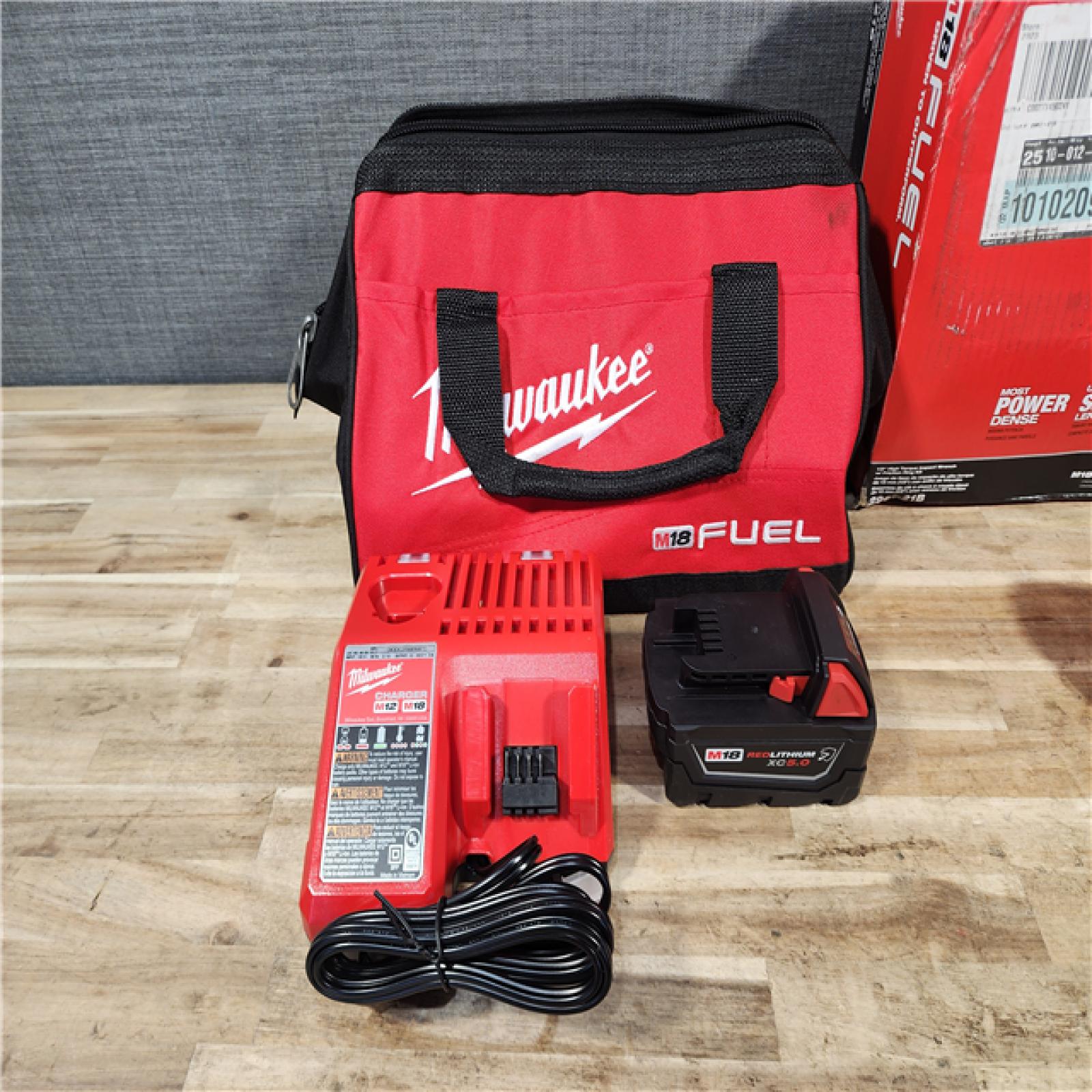 HOUSTON LOCATION - AS-IS (APPEARS LIKE NEW) Milwaukee FUEL 18V Lithium-Ion Brushless Cordless 1/2 in. Impact Wrench w/Friction Ring Kit