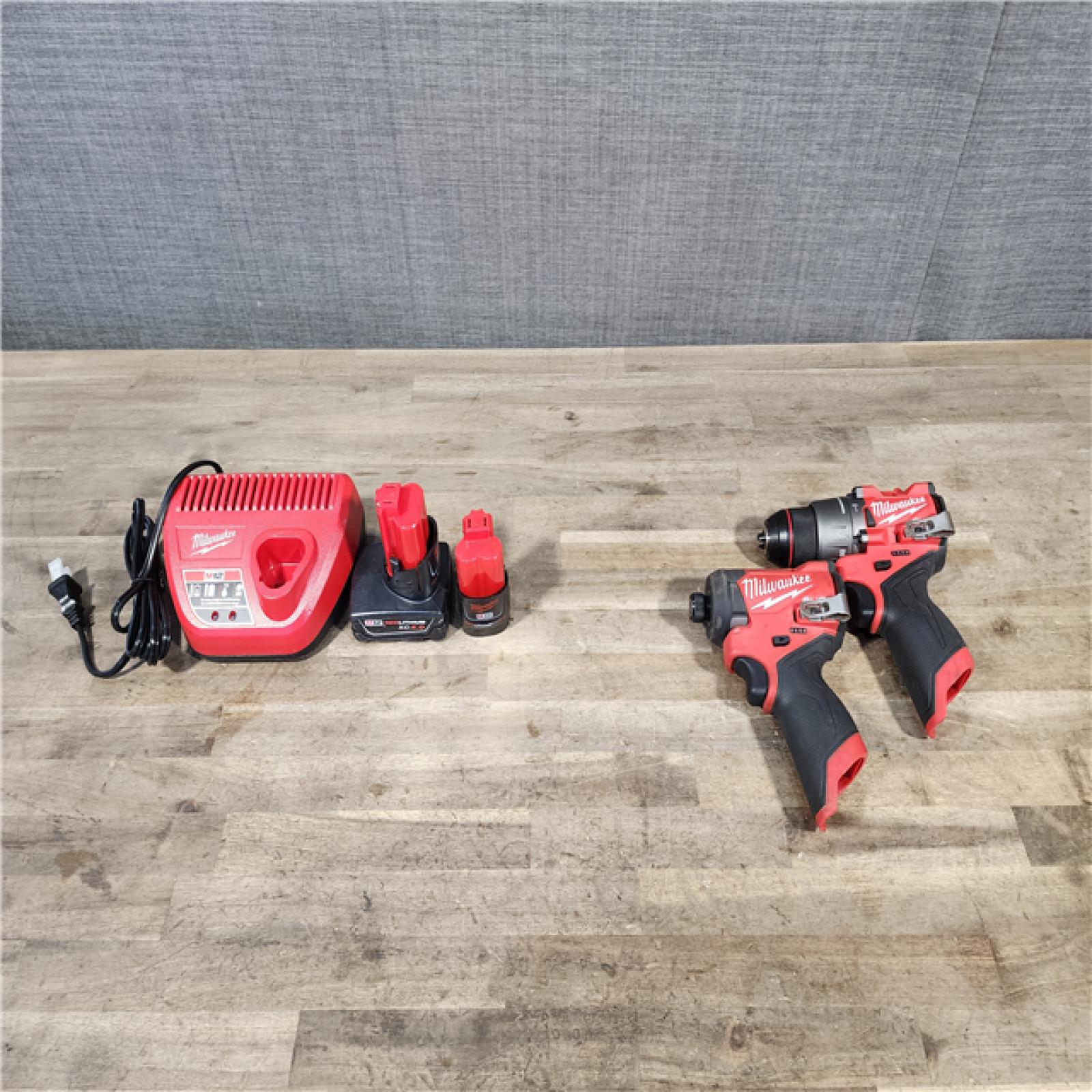 HOUSTON LOCATION - AS-IS Milwaukee 2 Tool Combo Kit W/ (2) Battery & Charger