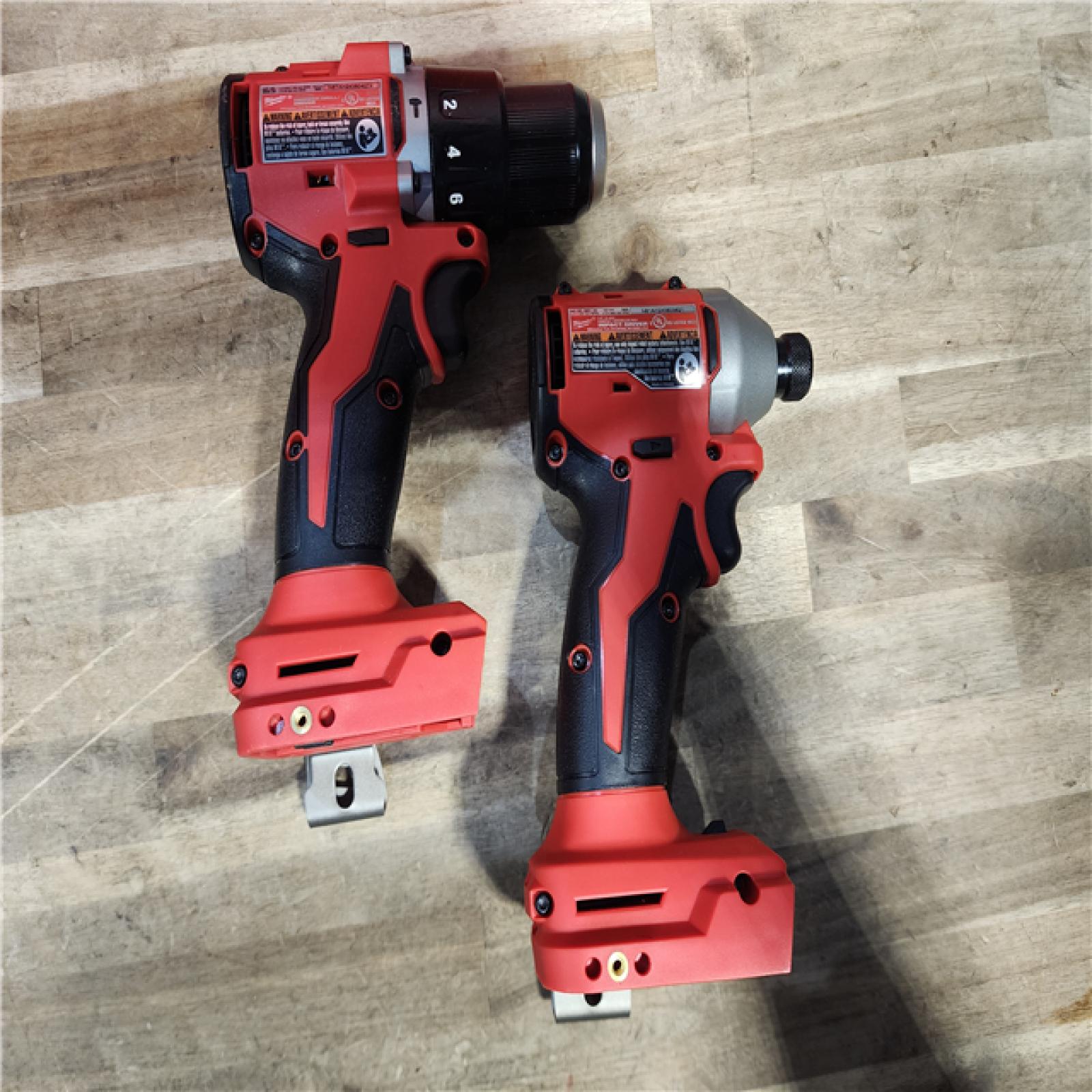 HOUSTON LOCATION - AS-IS M18 18-Volt Lithium-Ion Brushless Cordless Compact Hammer Drill/Impact Combo Kit (2-Tool) with (2) Batteries, Bag