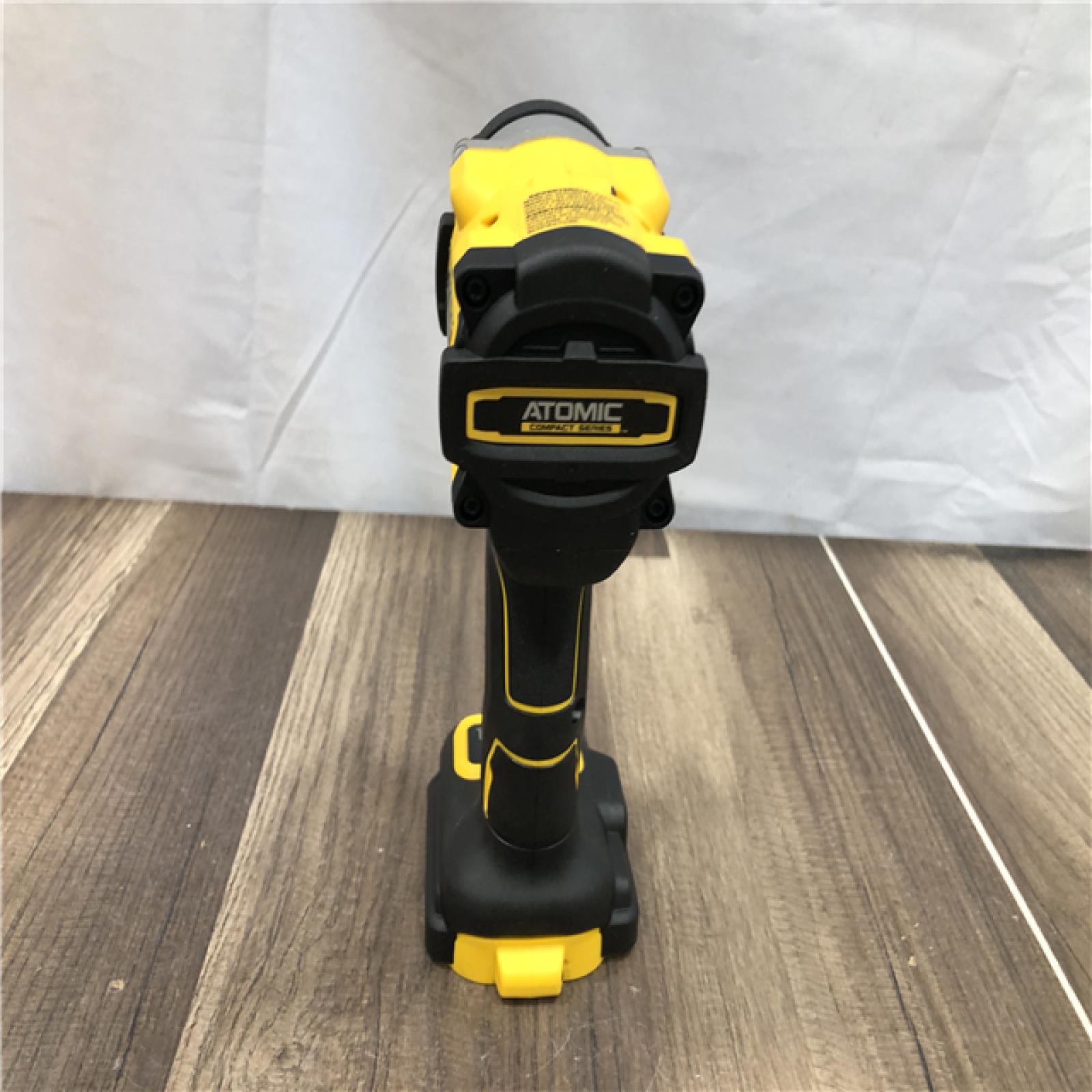 AS-IS DEWALT ATOMIC 20V MAX Cordless Brushless 1/2 in. Variable Speed Impact Wrench (Tool Only)