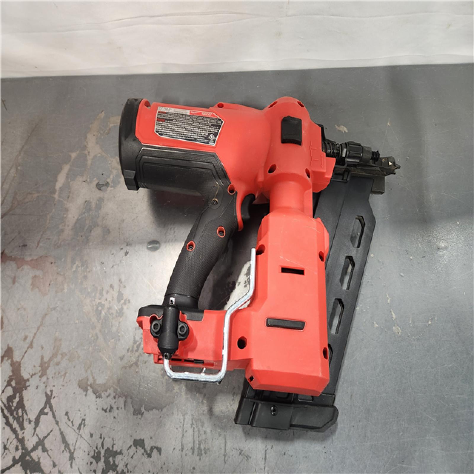 AS-IS- Nail Gun Cordless Strip Plastic 18 V