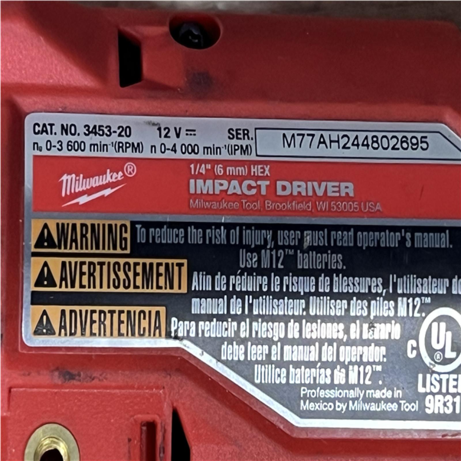 Houston Location AS-IS Milwaukee FUEL Impact Driver and Battery
