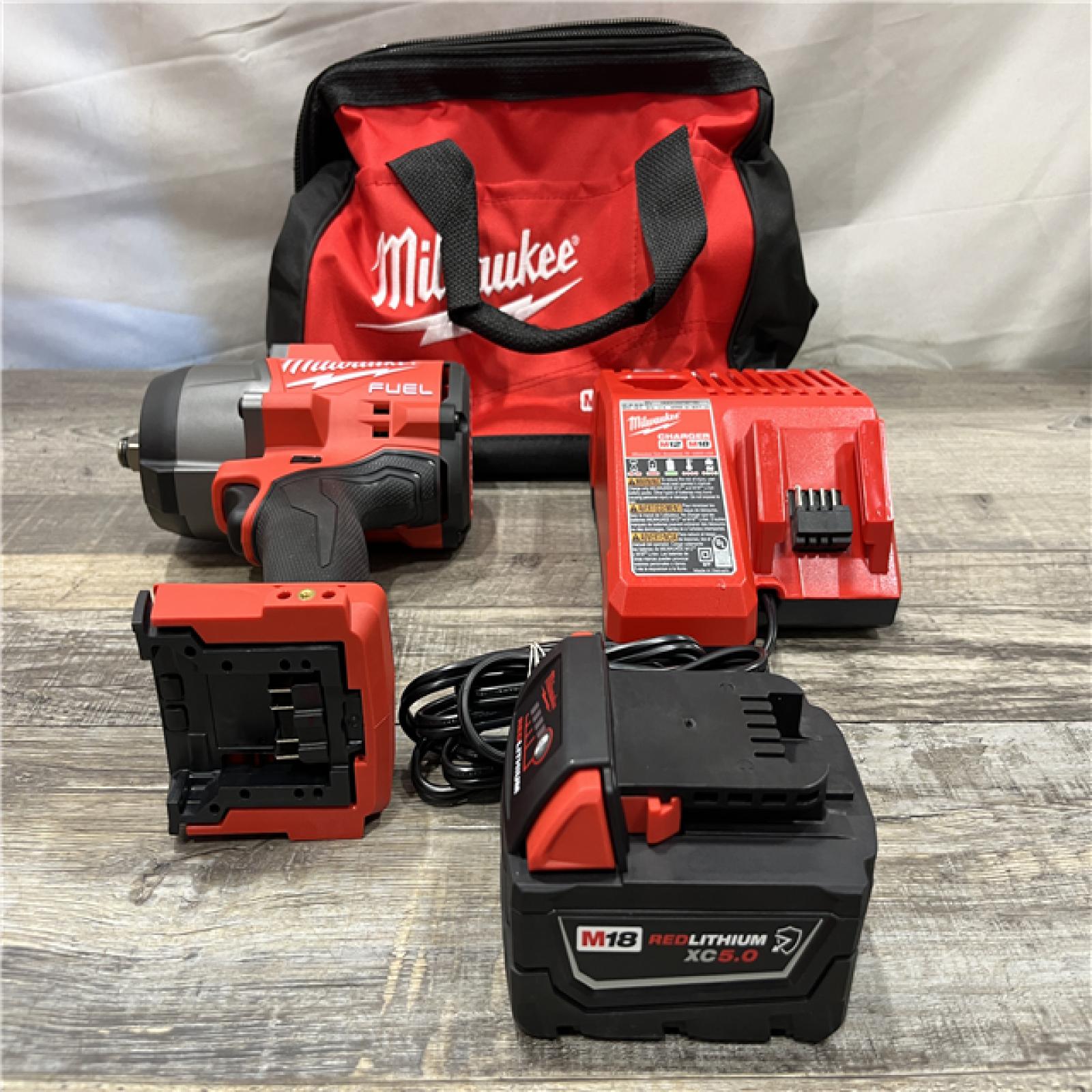 AS-IS Milwaukee FUEL 18V Lithium-Ion Brushless Cordless 1/2 in. Impact Wrench w/Friction Ring Kit