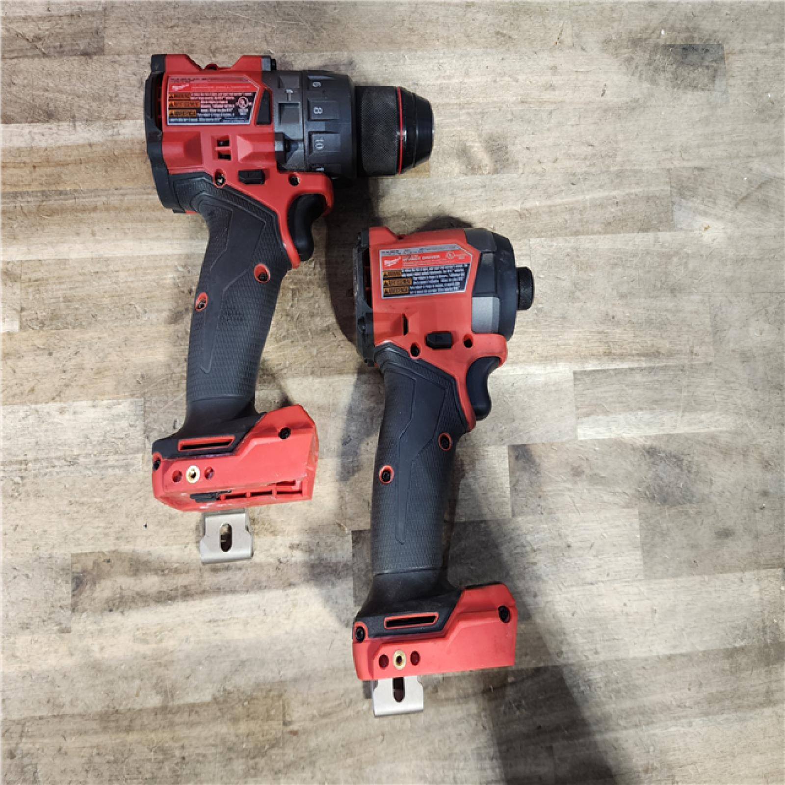 HOUSTON LOCATION - AS-IS Milwaukee FUEL 18V Lithium-Ion Brushless Cordless Hammer Drill and Impact Driver Combo Kit