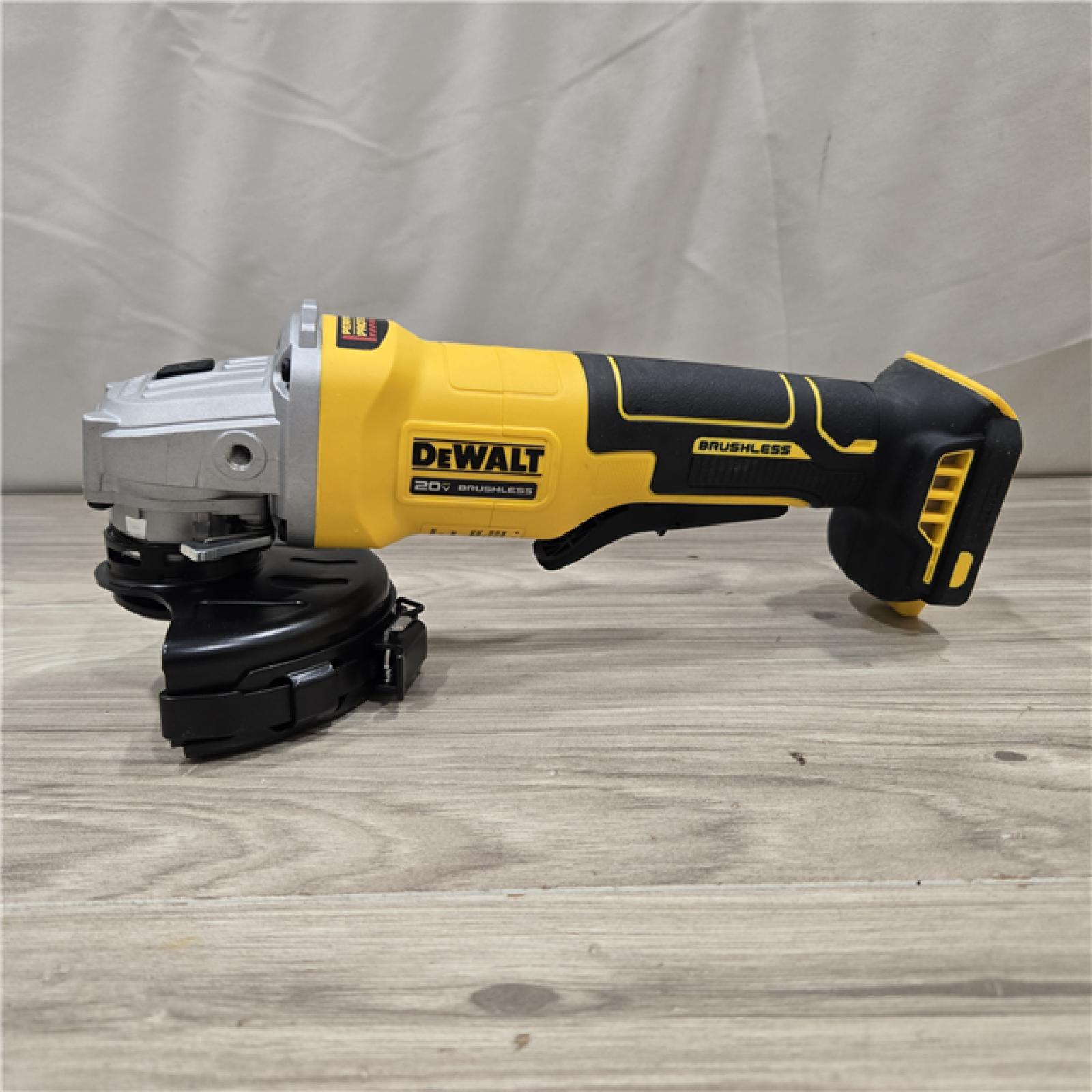 AS-IS DeWalt 20V MAX Cordless 4-1/2 in. Angle Grinder with Brake (Tool-Only)