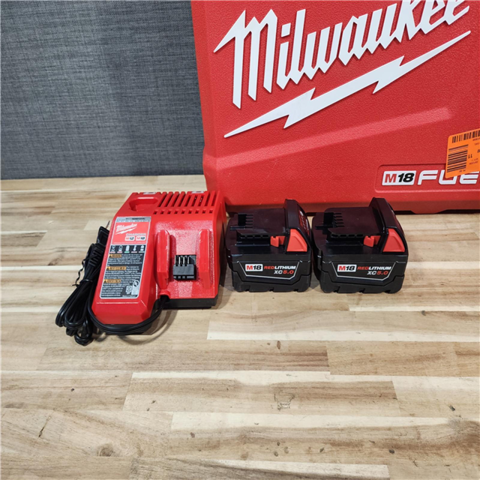 HOUSTON LOCATION - AS-IS Milwaukee FUEL 18V Lithium-Ion Brushless Cordless Hammer Drill and Impact Driver Combo Kit