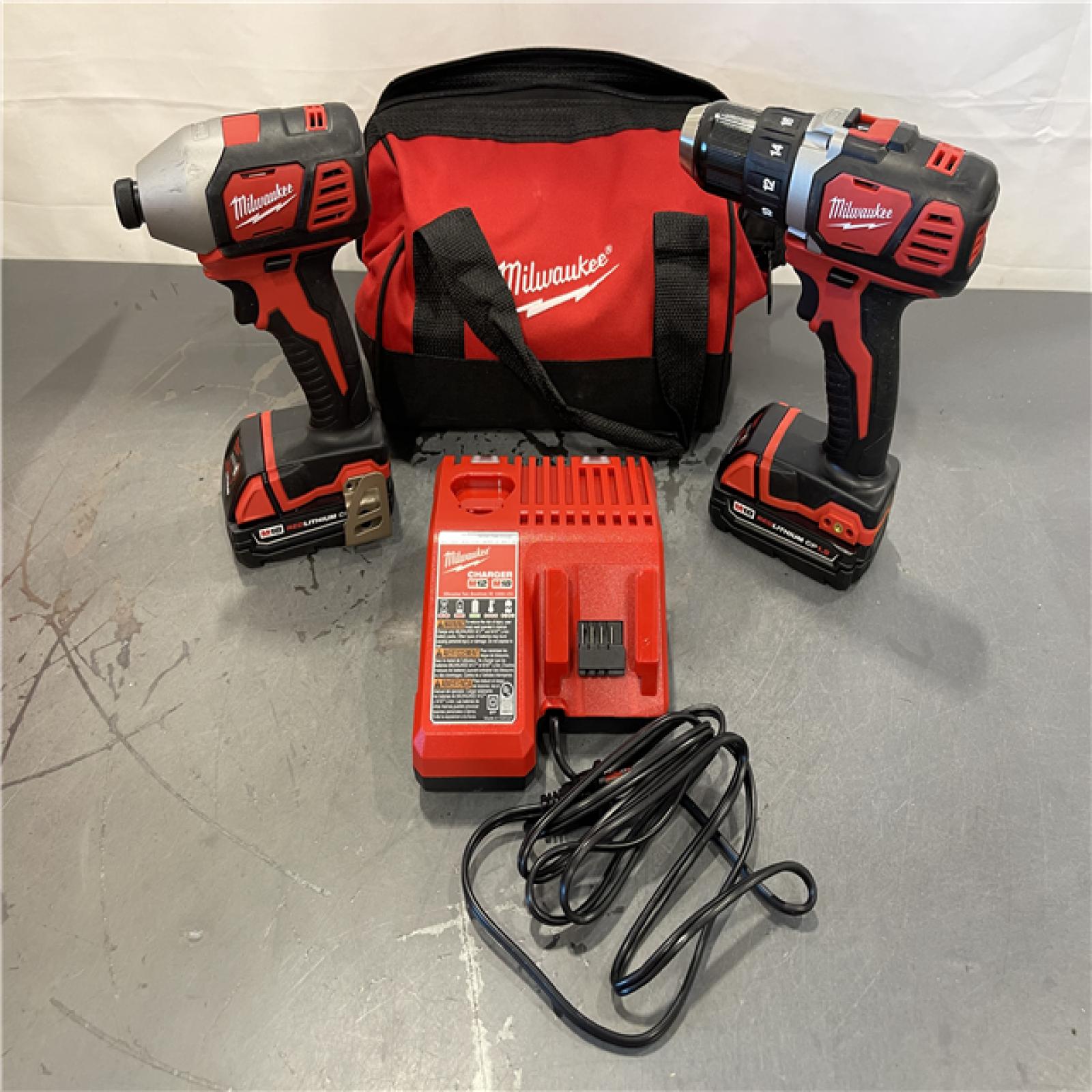 AS-IS - Milwaukee M18 18V Lithium-Ion Cordless Drill Driver/Impact Driver Combo Kit
