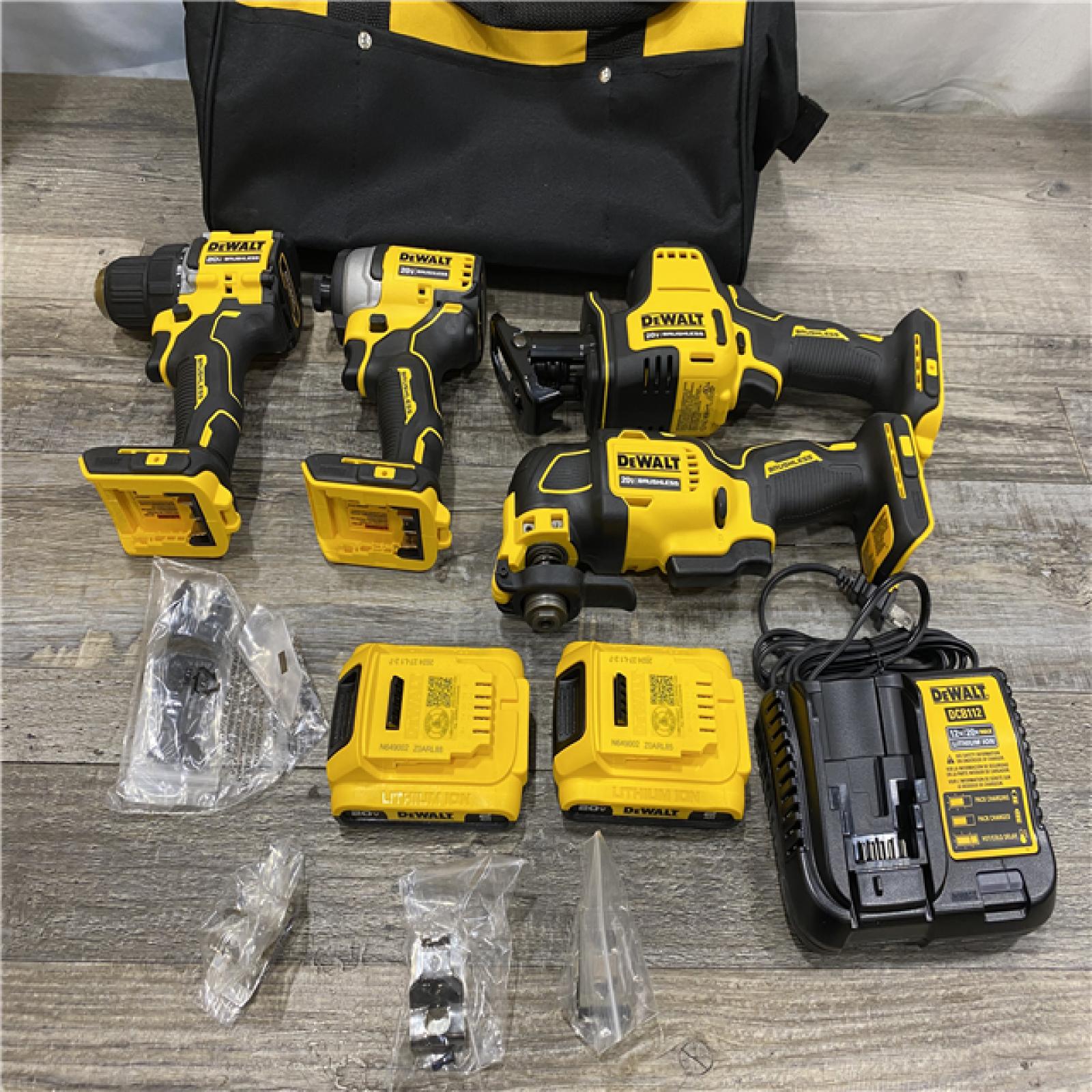 AS-IS DEWALT ATOMIC 20-Volt Lithium-Ion Cordless Brushless (4-Tool) Combo Kit