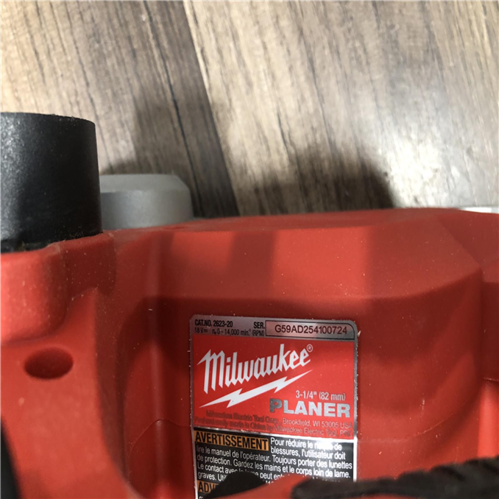 AS-IS Milwaukee M18 18V Lithium-Ion Cordless 3-1/4 in. Planer (Tool-Only)