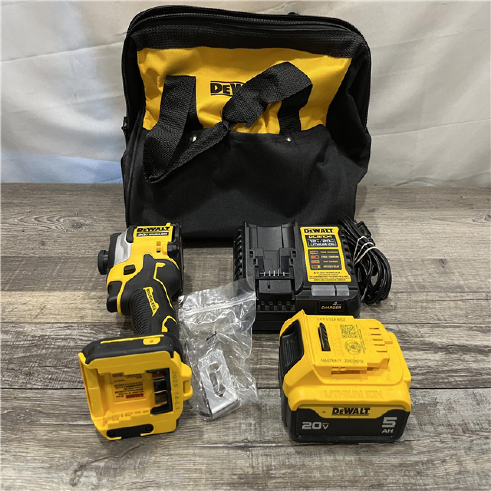 AS-IS DEWALT ATOMIC 20V MAX Lithium-Ion Cordless 1/4 in. Brushless Impact Driver Kit