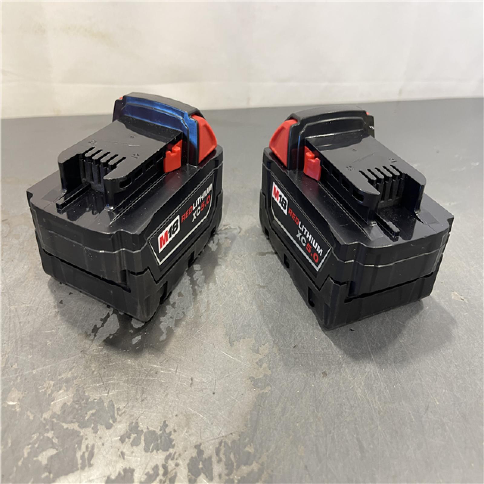 AS-IS - Milwaukee M18 18-Volt Lithium-Ion XC Starter Kit with Two 5.0Ah Batteries and Charger