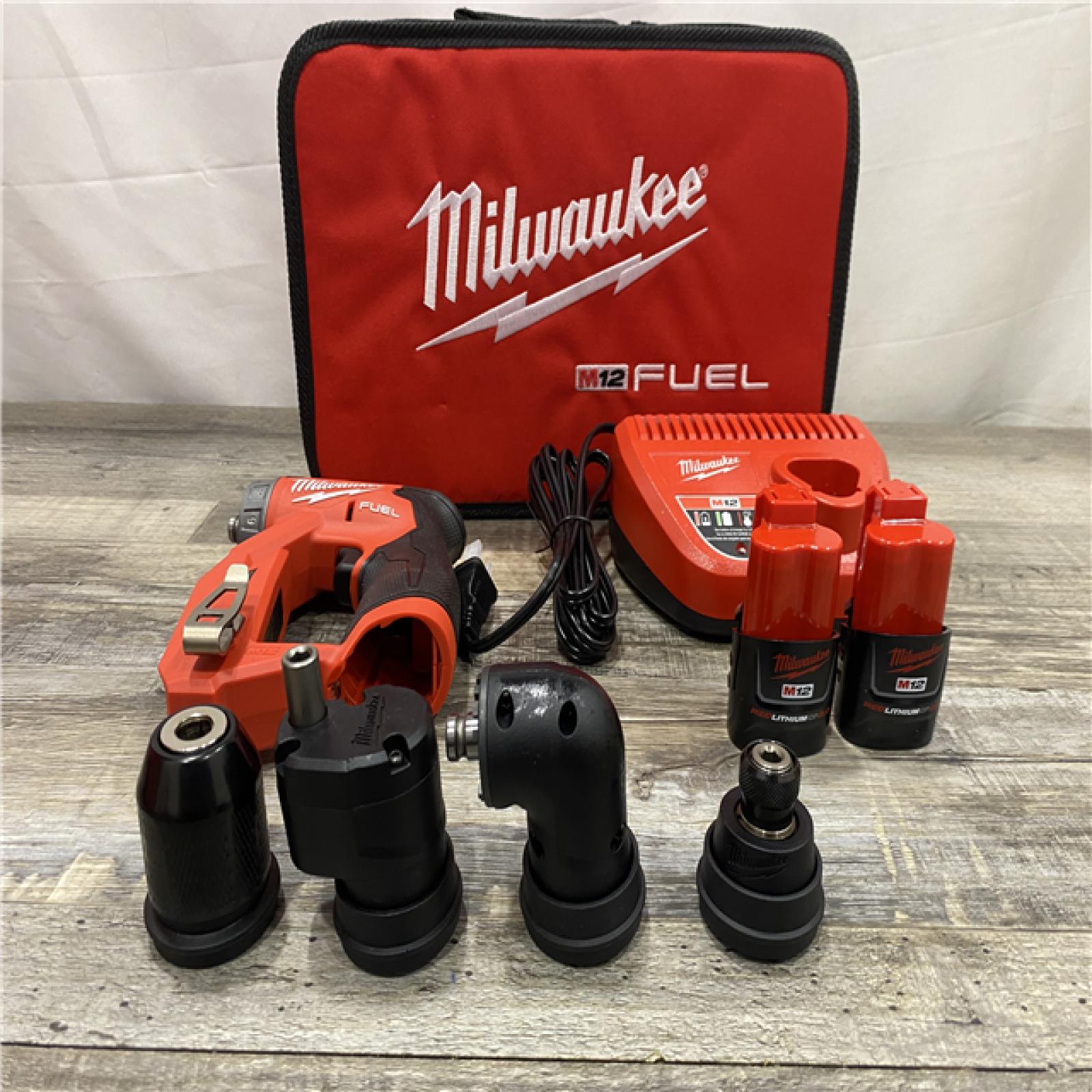 AS-IS Milwaukee FUEL 12V Lithium-Ion Brushless Cordless 4-in-1 Installation 3/8 in. Drill Driver Kit