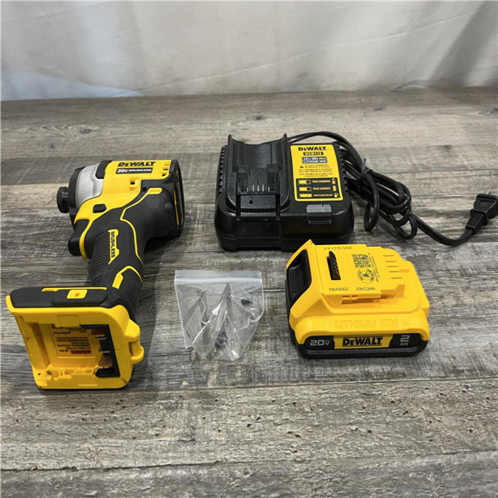 AS-IS DEWALT Atomic 20V Max Lithium-Ion Brushless Cordless Compact 1/4 in. Impact Driver Kit