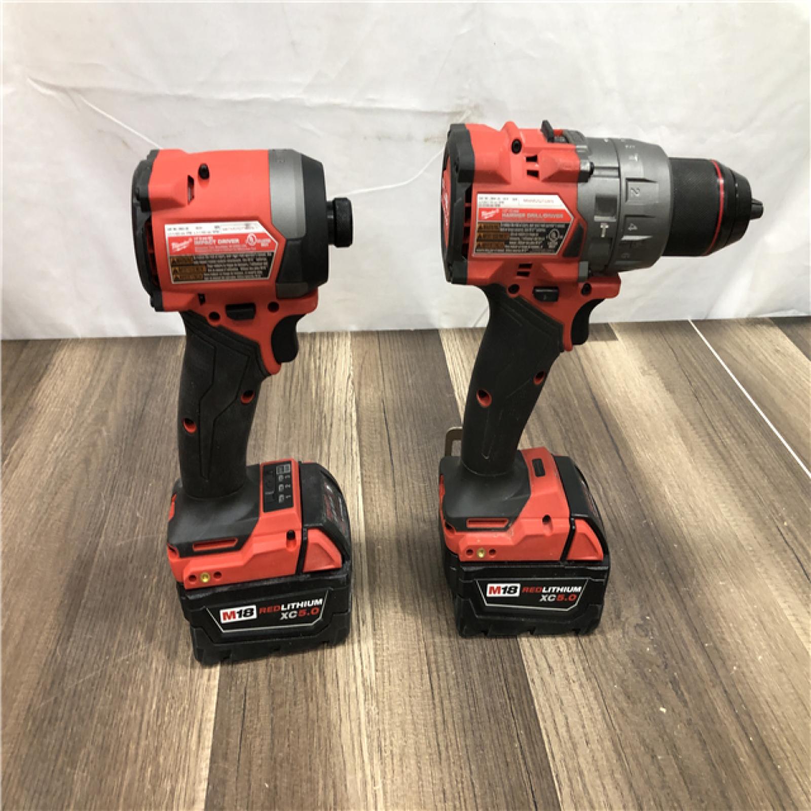 AS-IS Milwaukee FUEL 18V Lithium-Ion Brushless Cordless Hammer Drill and Impact Driver Combo Kit
