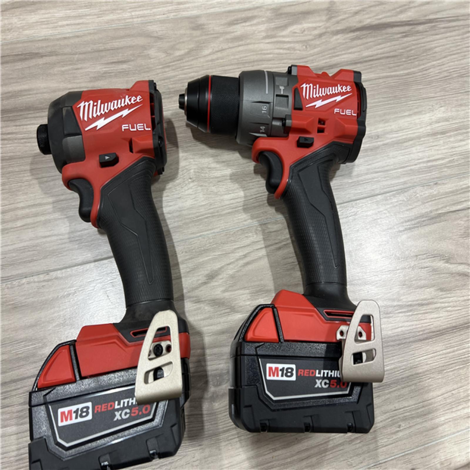 AS-IS Milwaukee FUEL 18V Lithium-Ion Brushless Cordless Hammer Drill and Impact Driver Combo Kit