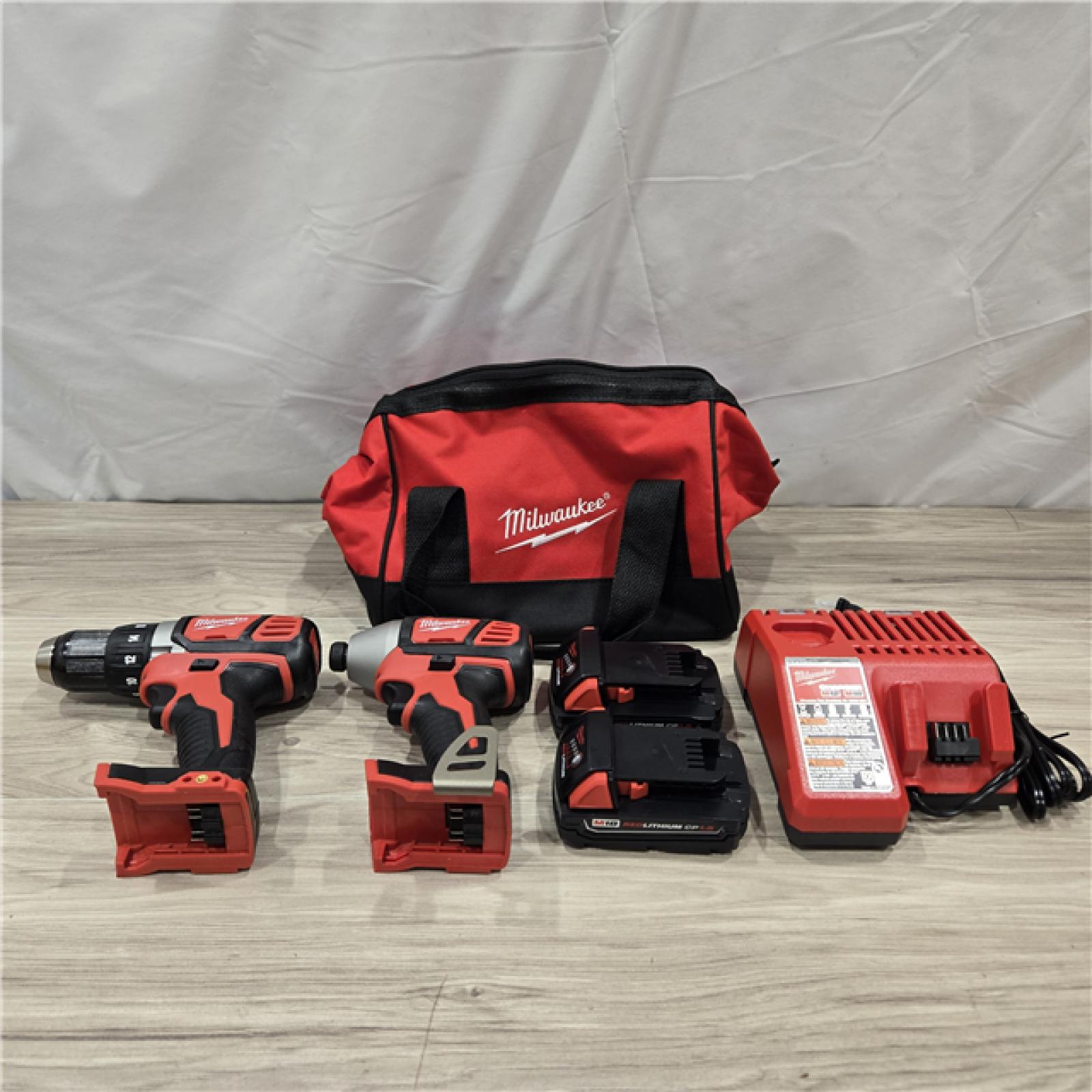 AS-IS Milwaukee 18V Cordless 2-Tool Drill/Driver and Impact Driver Kit