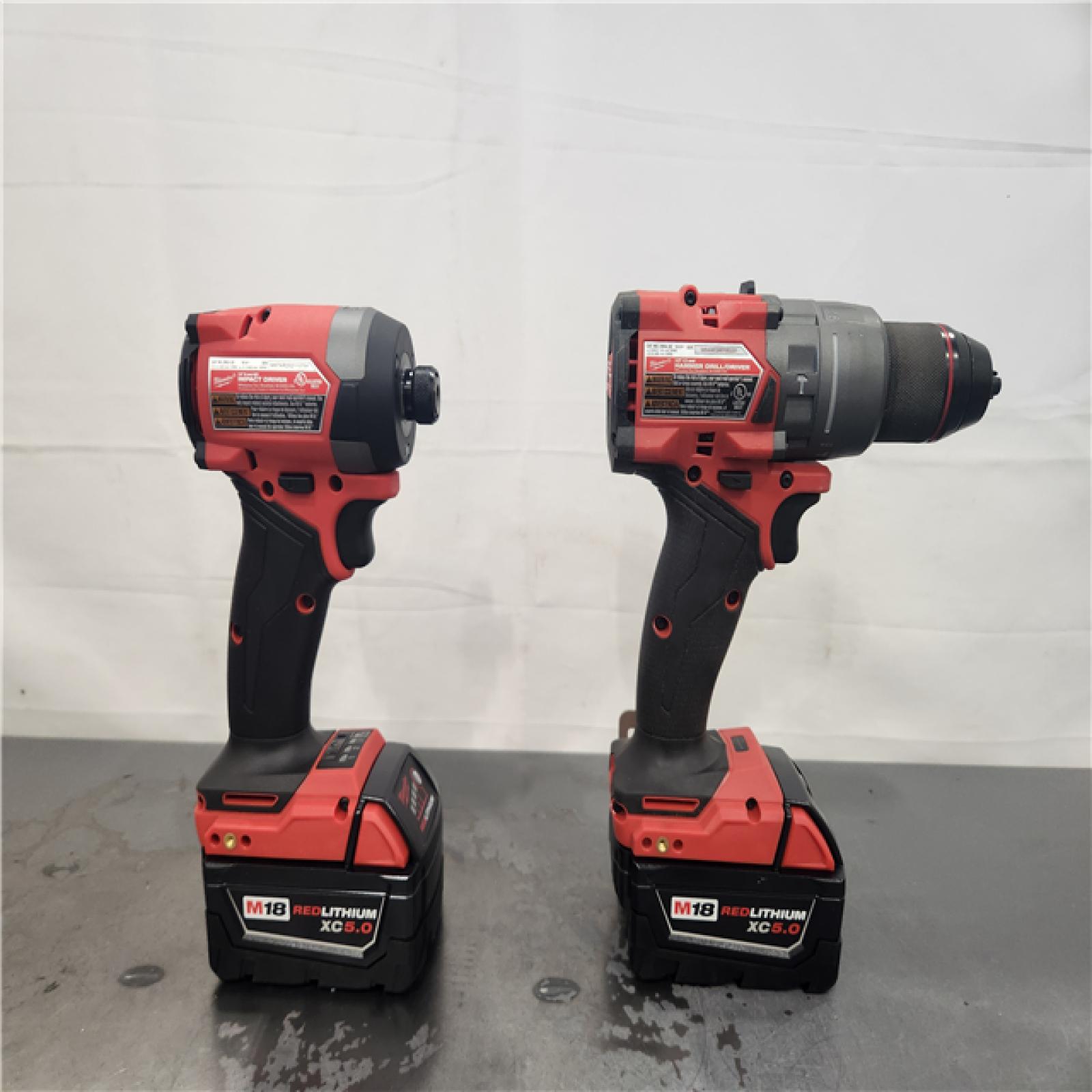 AS-IS- Milwaukee FUEL 18V Lithium-Ion Brushless Cordless Hammer Drill and Impact Driver Combo Kit (2-Tool) with 2 Batteries