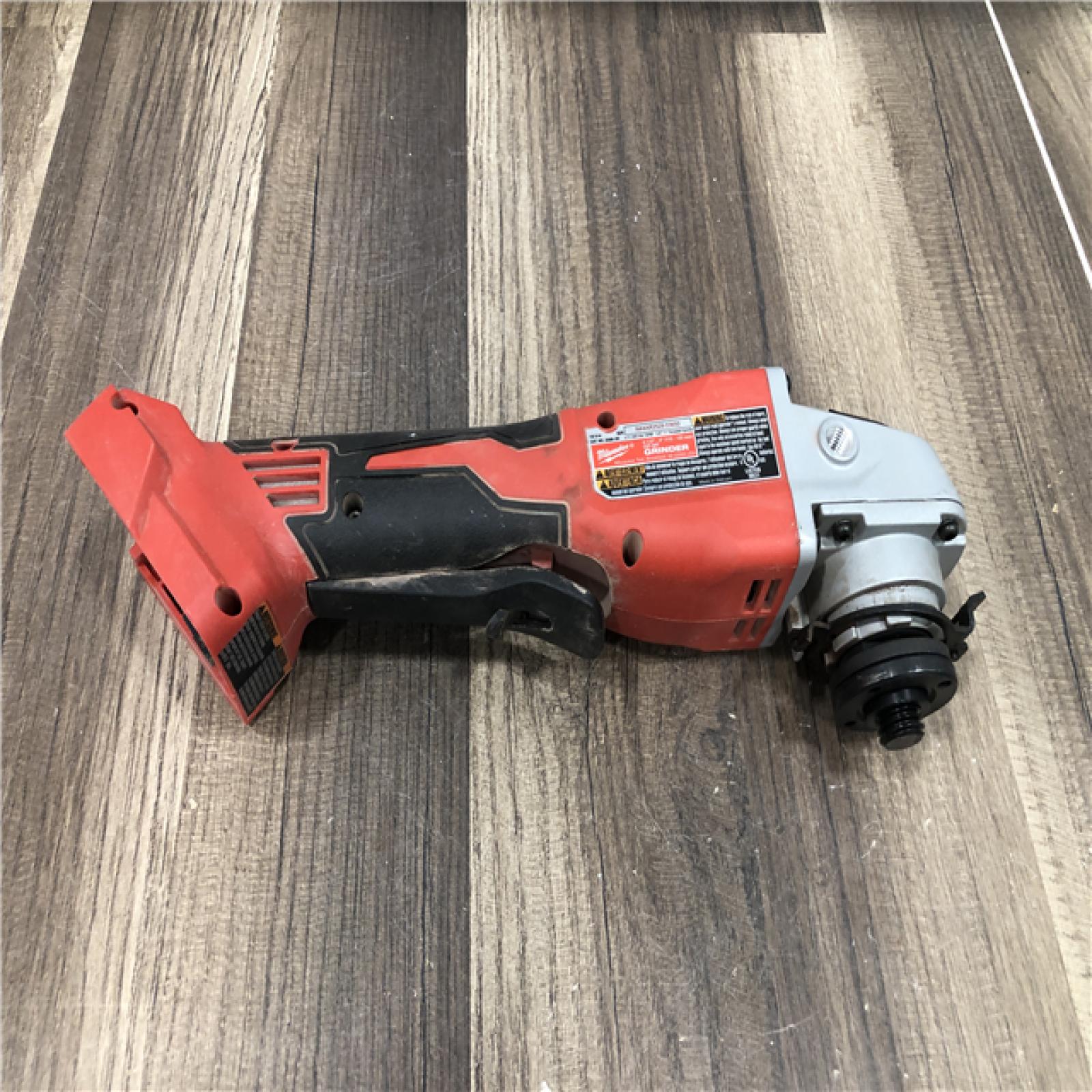 AS-IS Milwaukee 18V Lithium-Ion Brushless Cordless 4-1/2 in./5 in. Grinder w/Paddle Switch (Tool-Only)