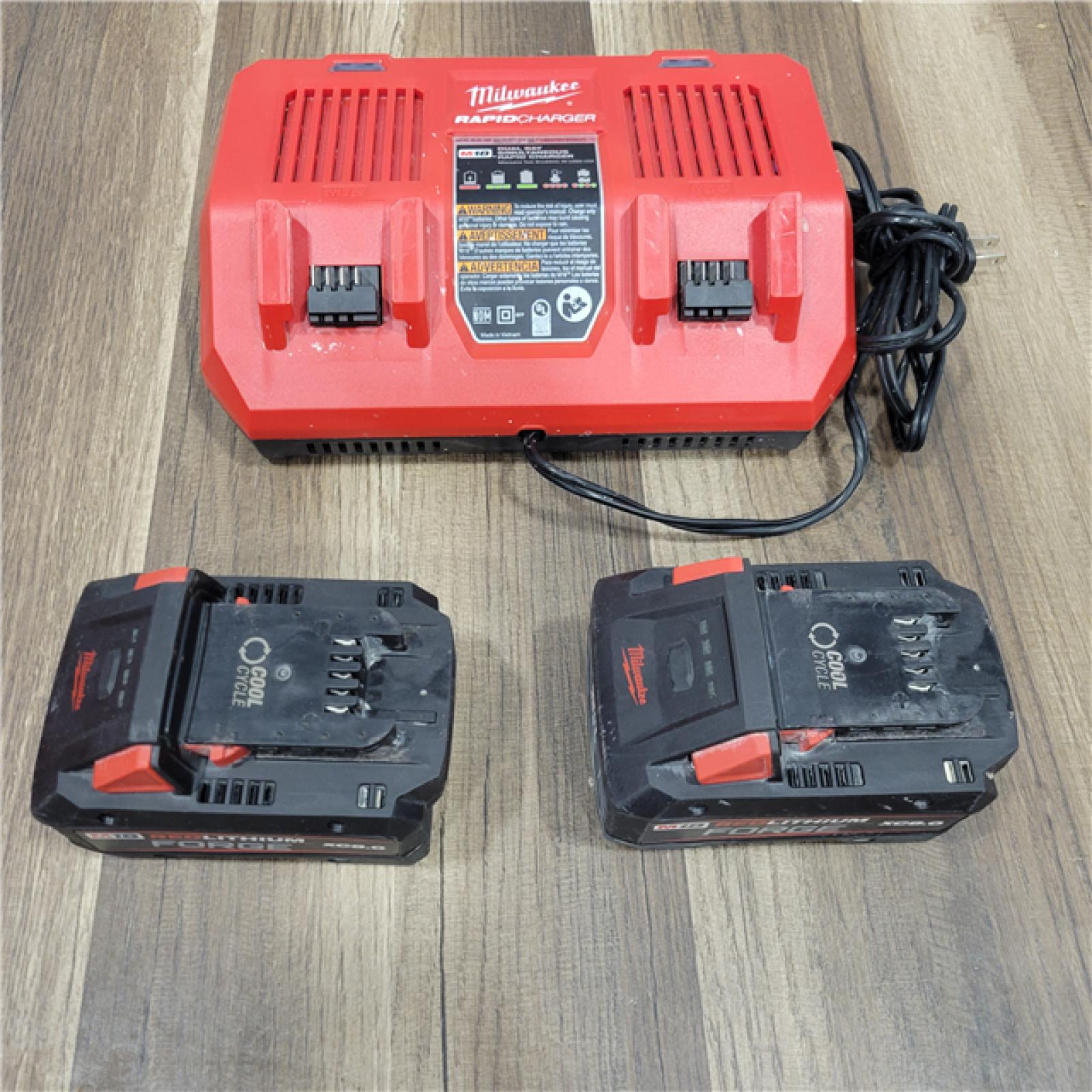 AS-IS  Milwaukee Kit with Two XC 8.0 Ah Battery and Dual Bay Rapid Charger