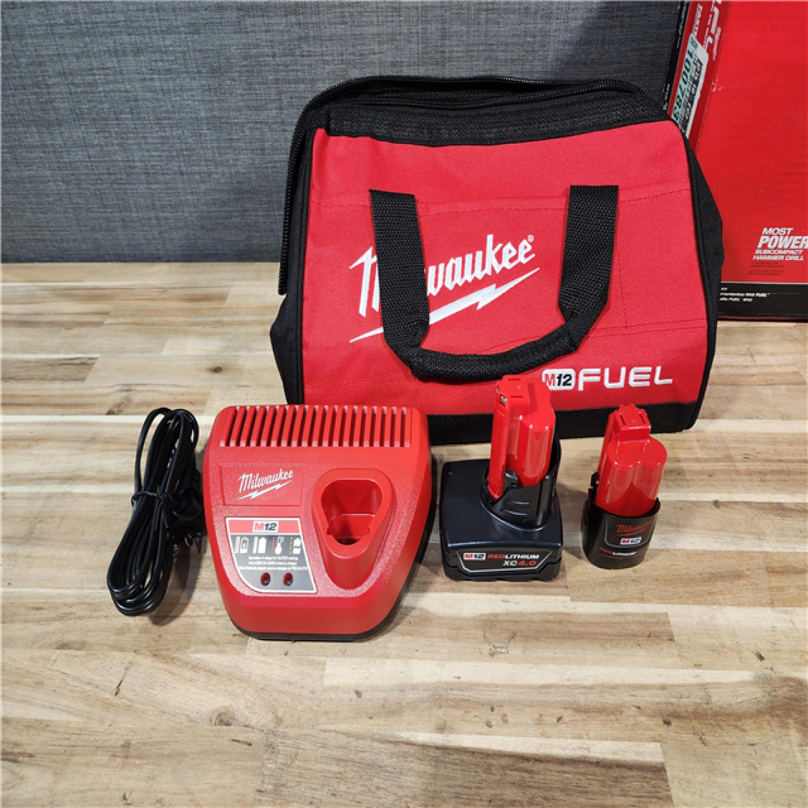 HOUSTON LOCATION - AS-IS Milwaukee FUEL 12-Volt Lithium-Ion Brushless Cordless Hammer Drill and Impact Driver Combo Kit