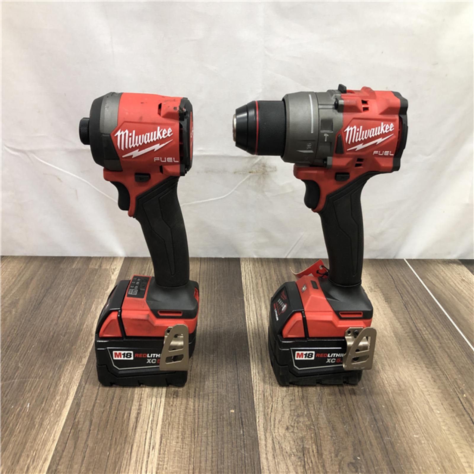 AS-IS Milwaukee  FUEL 18V Lithium-Ion Brushless Cordless Hammer Drill and Impact Driver Combo Kit