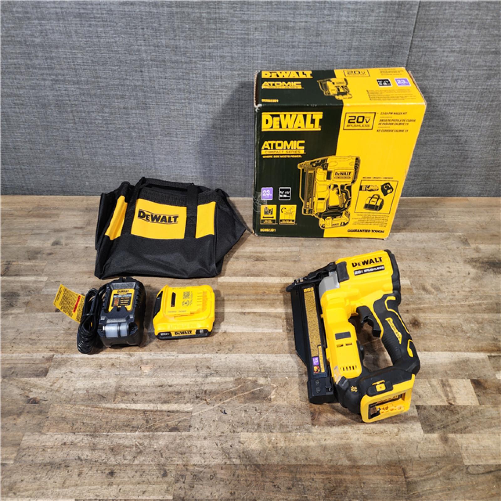 HOUSTON LOCATION - AS-IS DEWALT ATOMIC 20V MAX Lithium Ion Cordless 23 Gauge Pin Nailer Kit