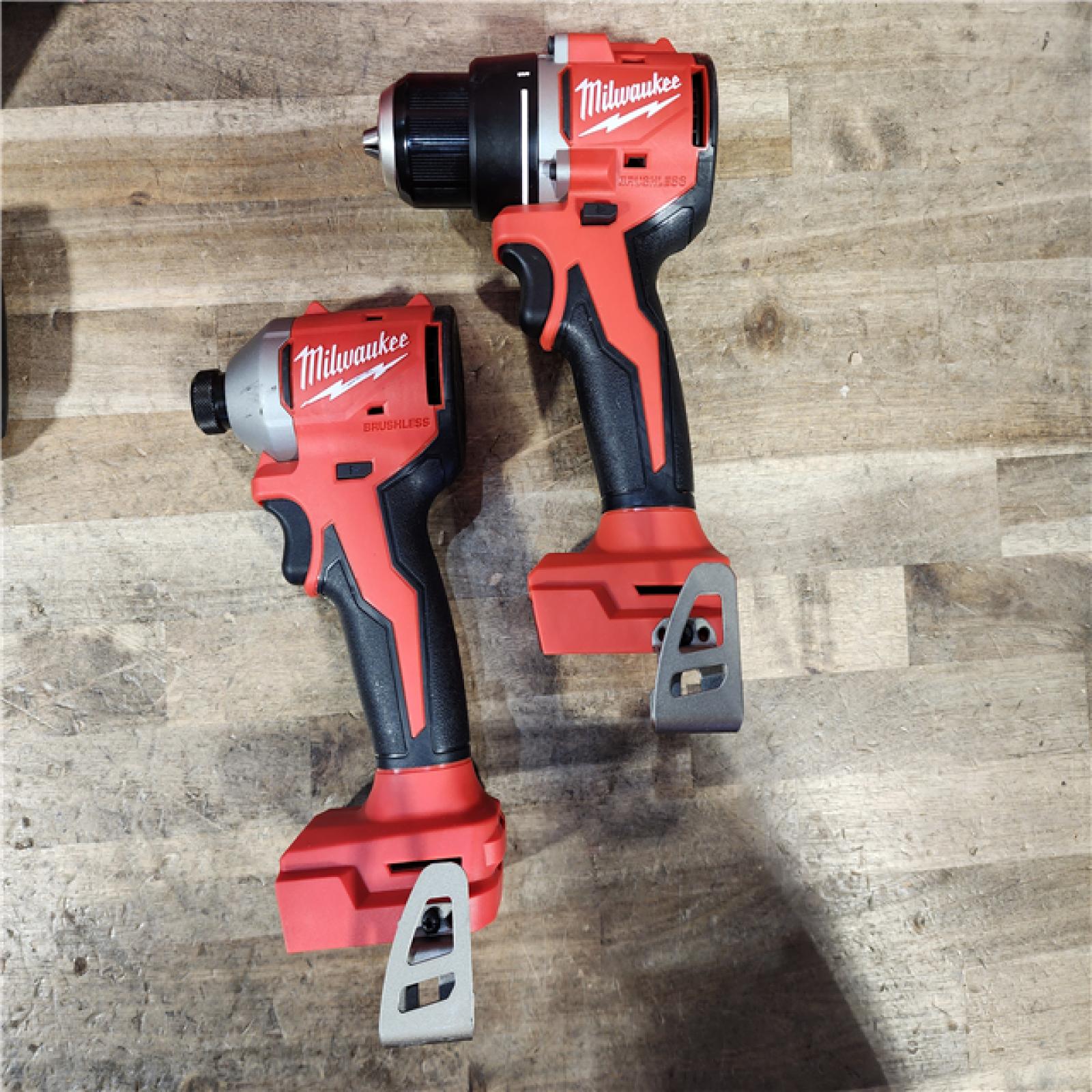 HOUSTON LOCATION - AS-IS Milwaukee M18 18V Lithium-Ion Brushless Cordless Compact Drill/Impact Combo Kit (2-Tool) W/(2) 2.0 Ah Batteries  Charger & Bag