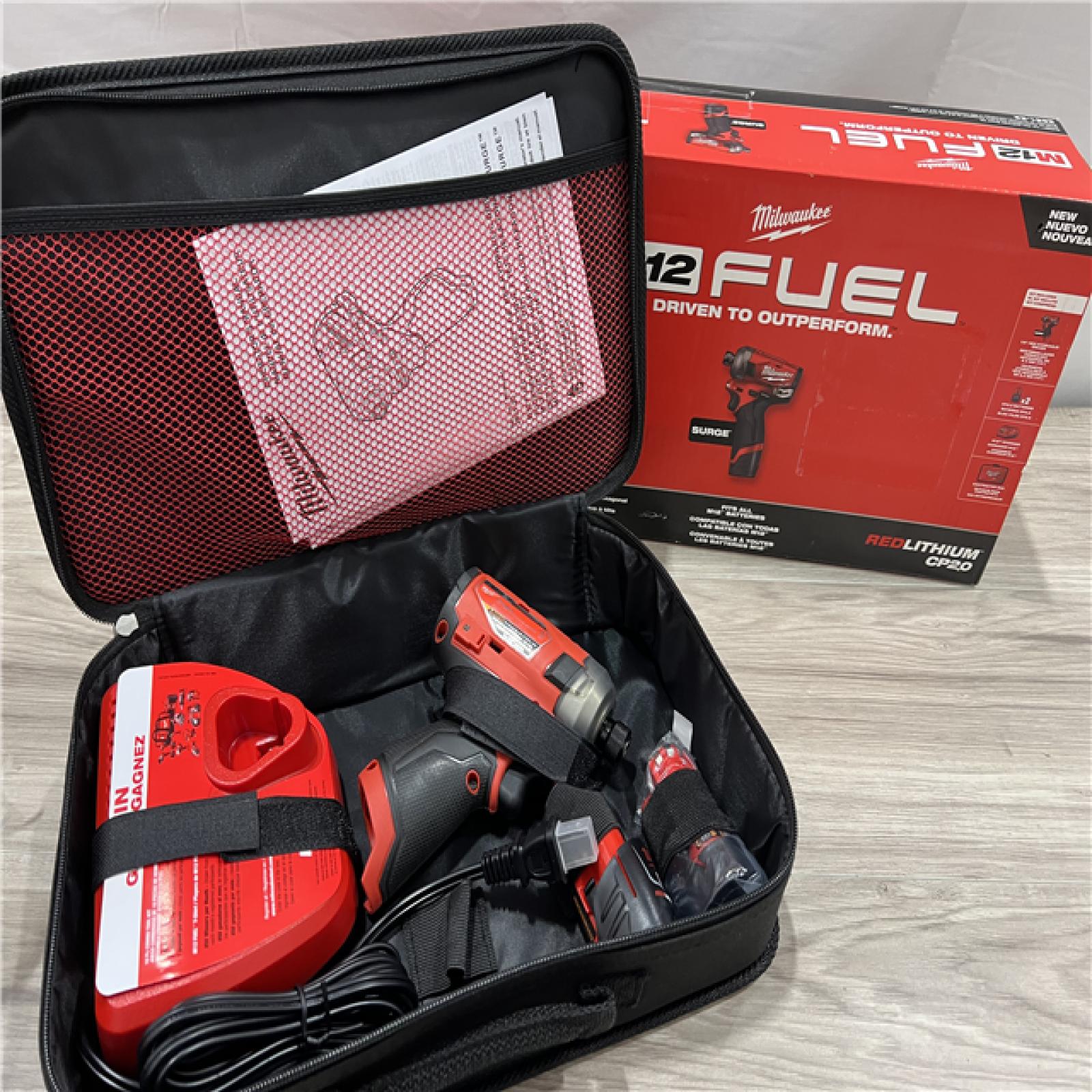 AS-IS Milwaukee FUEL SURGE 12V Lithium-Ion Brushless Cordless 1/4 in. Hex Impact Driver Compact Kit