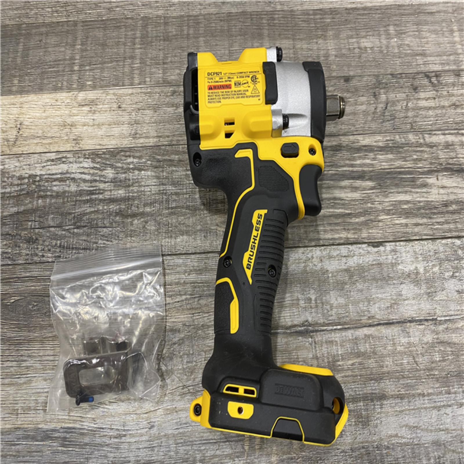 AS-IS DEWALT ATOMIC 20V MAX Cordless Brushless 1/2 in. Variable Speed Impact Wrench (Tool Only)