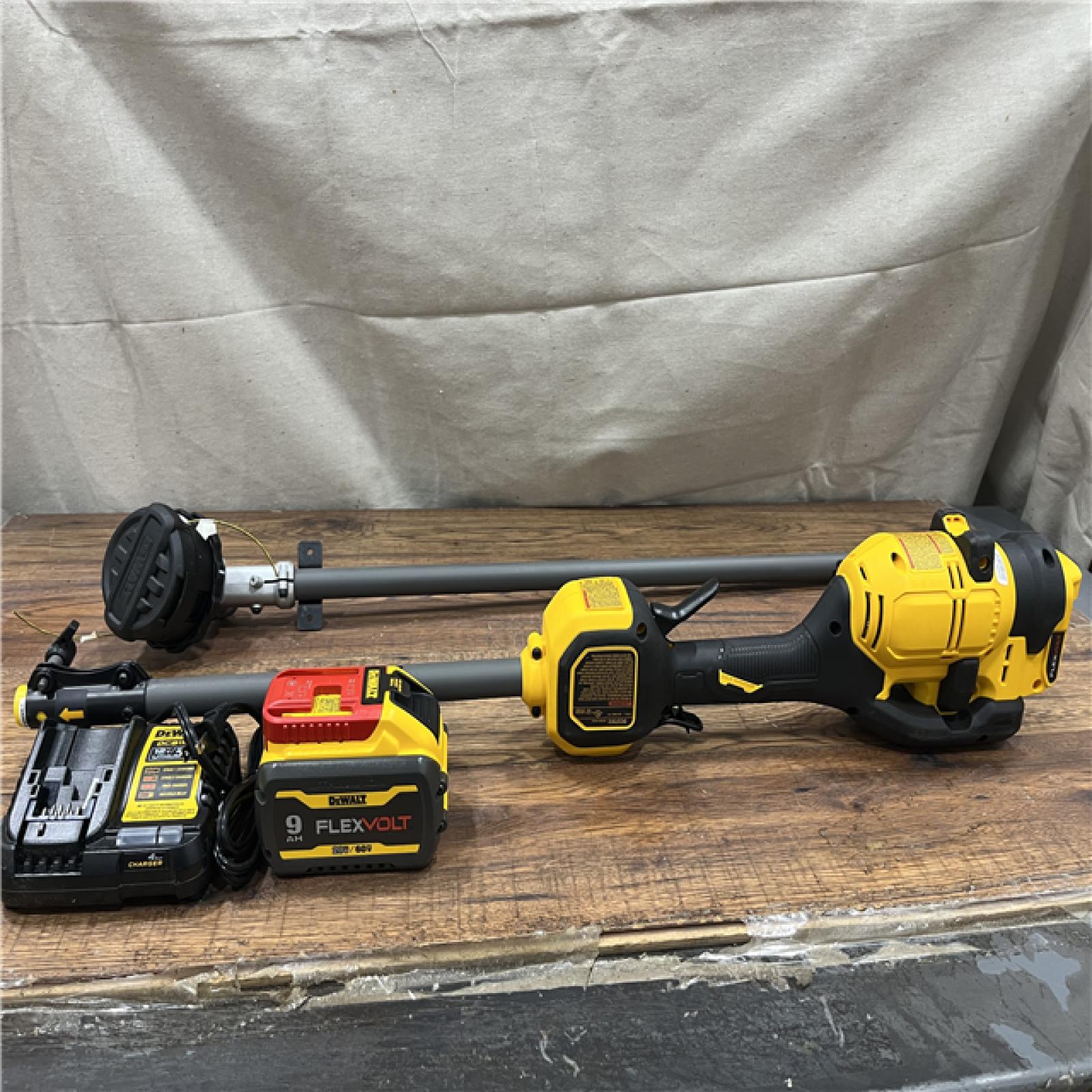 AS-IS DEWALT FLEXVOLT 60V MAX 17 in. Cordless Battery Powered Attachment Capable Trimmer Kit with (1) FLEXVOLT 3 Ah Battery & Charger